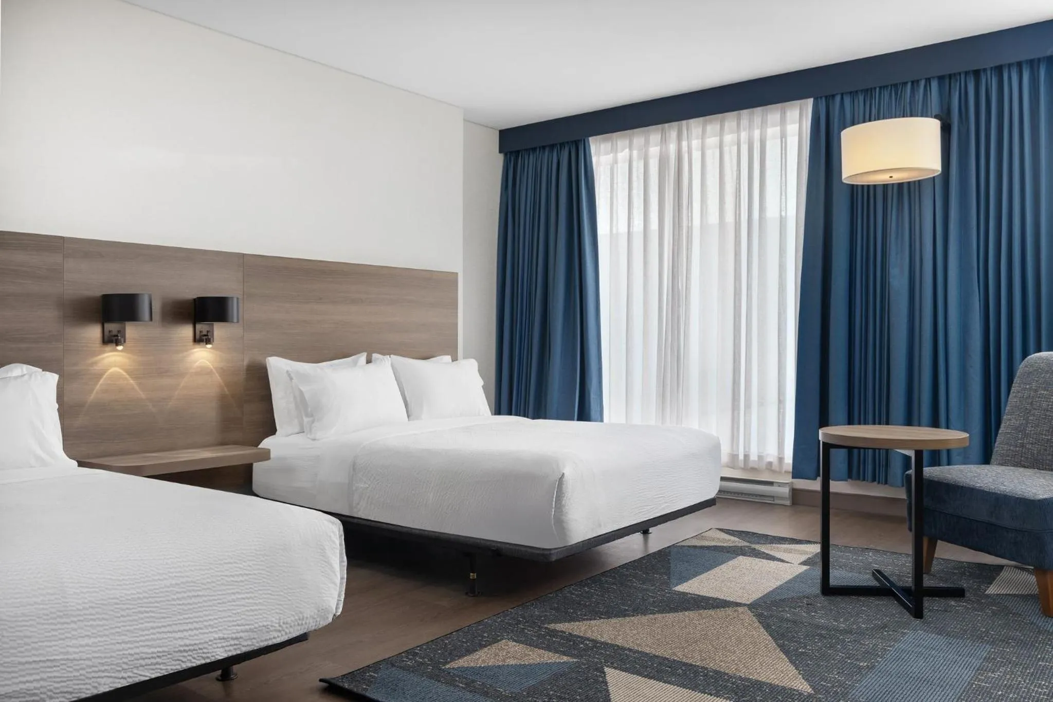 Photo of the whole room in Holiday Inn Express Montreal Airport - St-Laurent by IHG