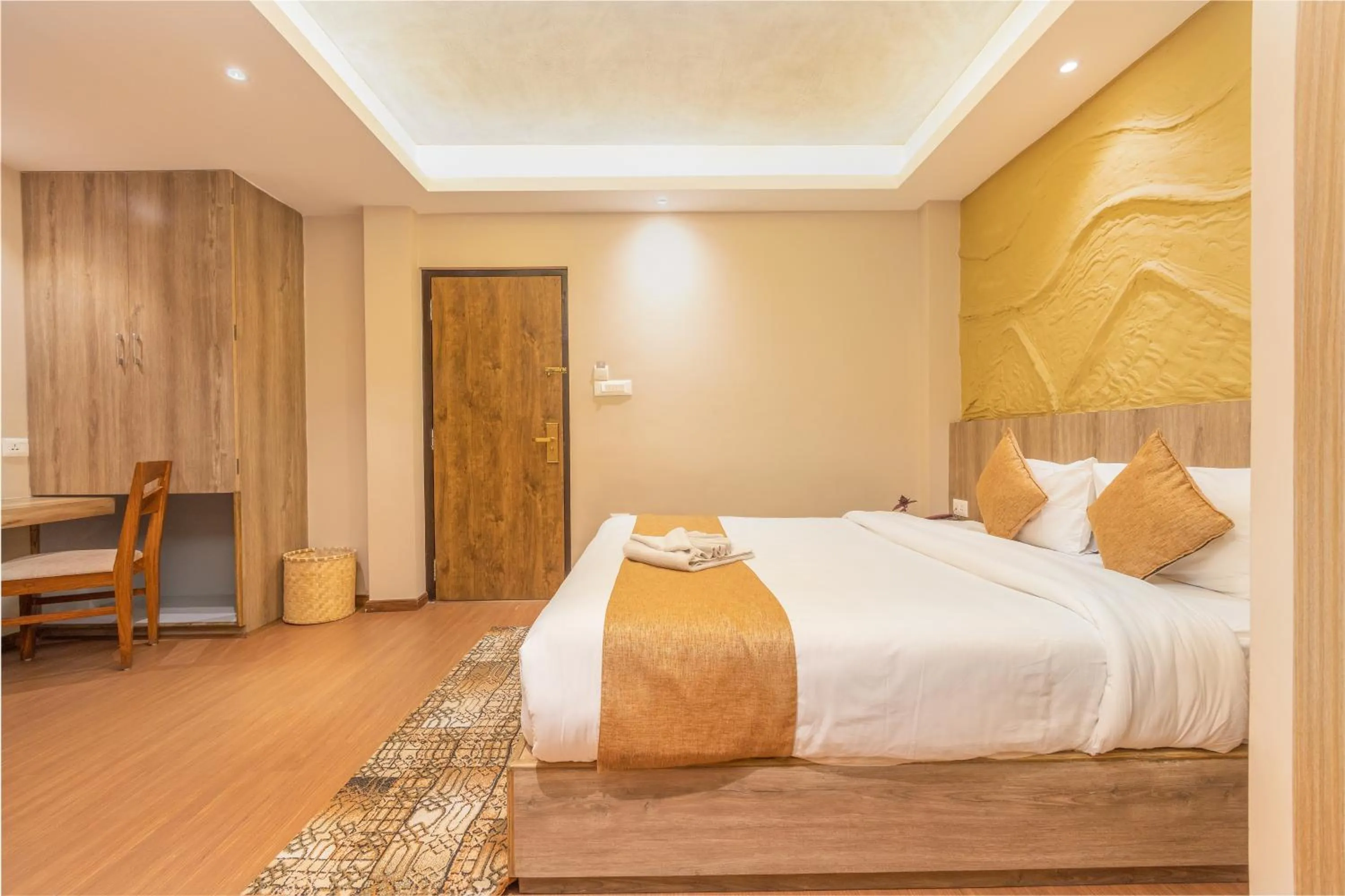 Bed in Divya Boutique Inn