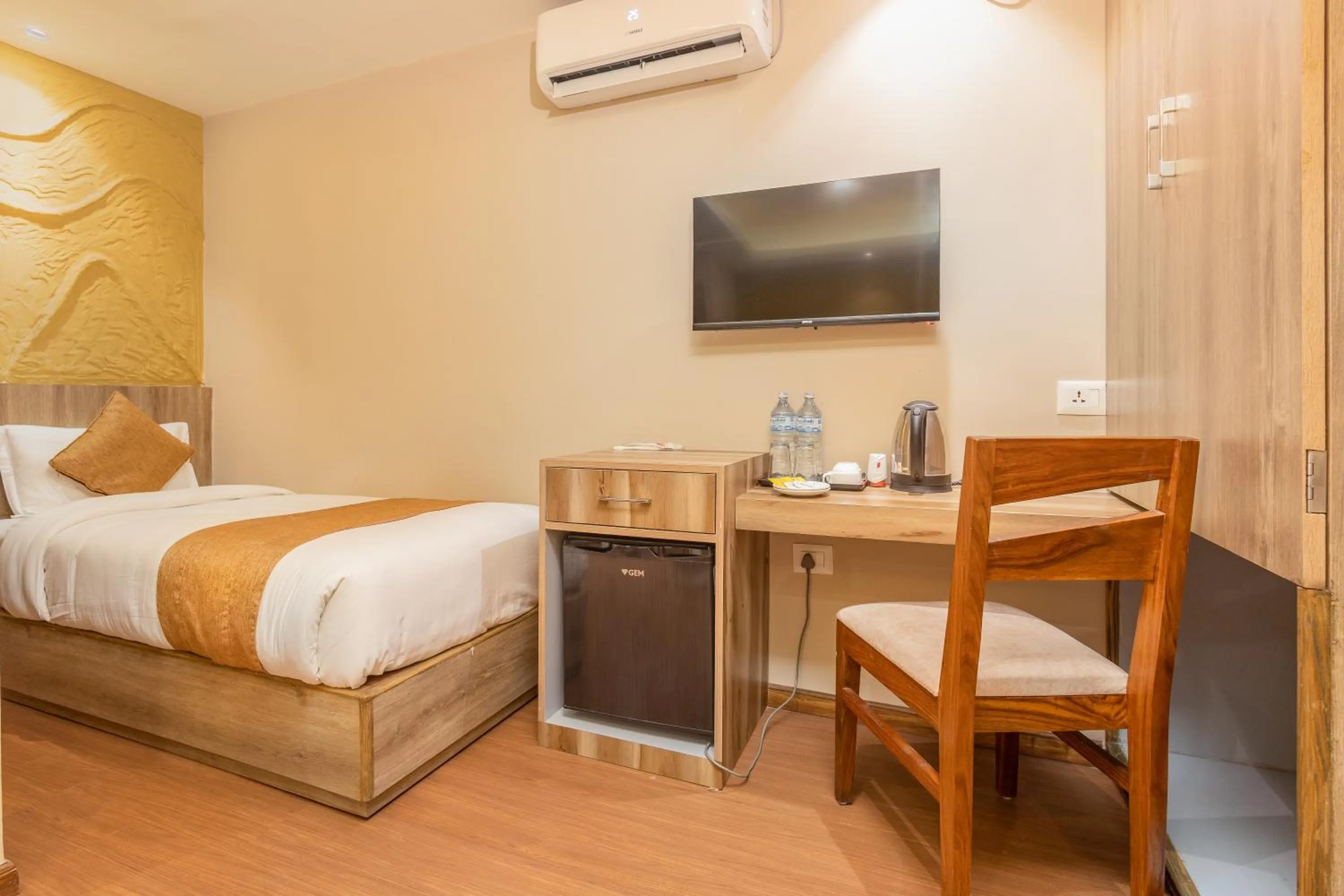 Bed in Divya Boutique Inn