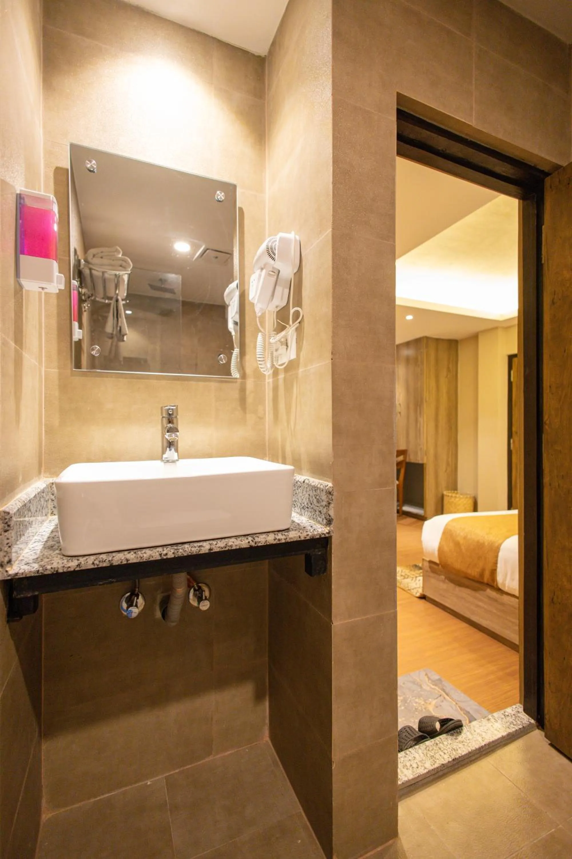 Bed in Divya Boutique Inn