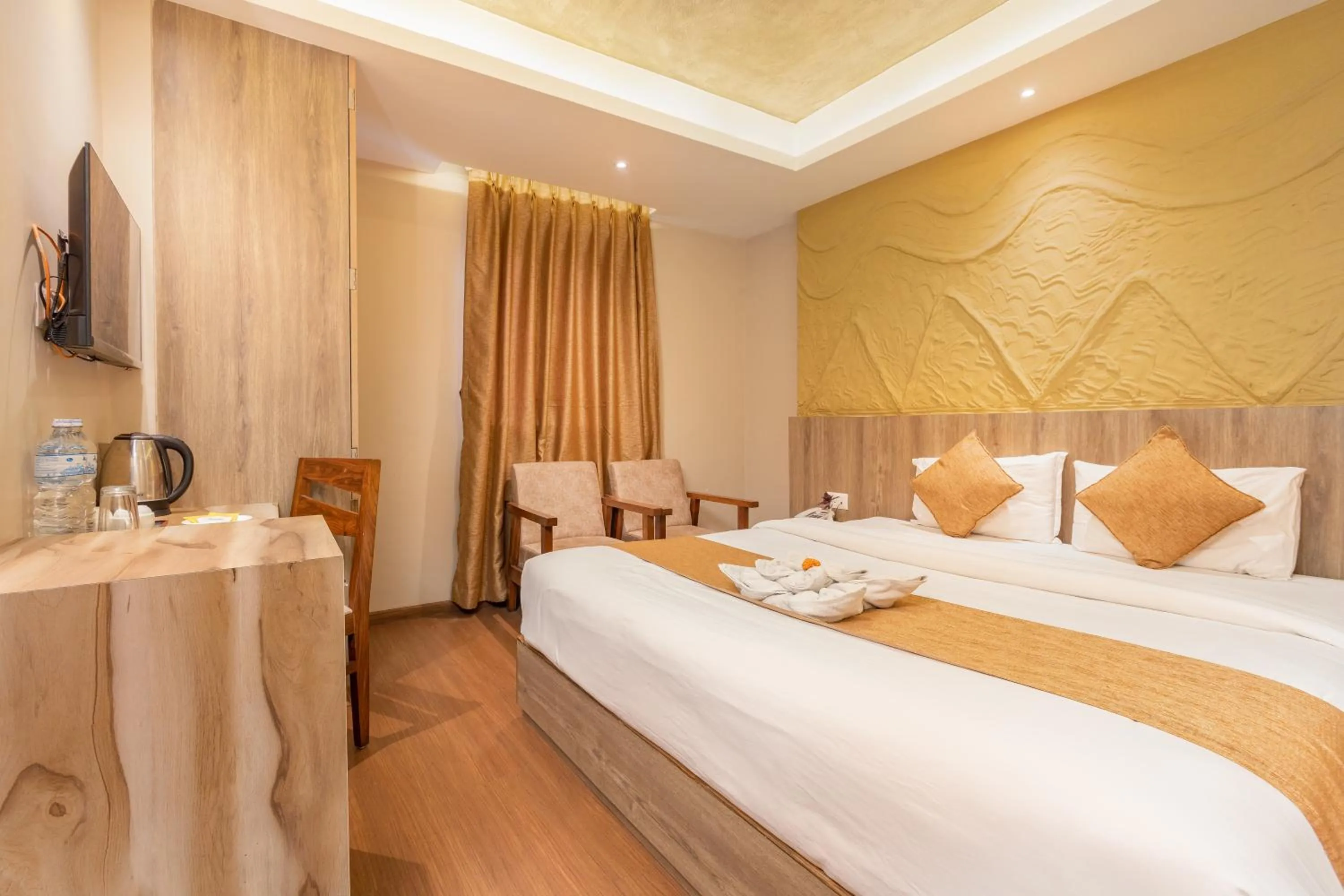 Bed in Divya Boutique Inn