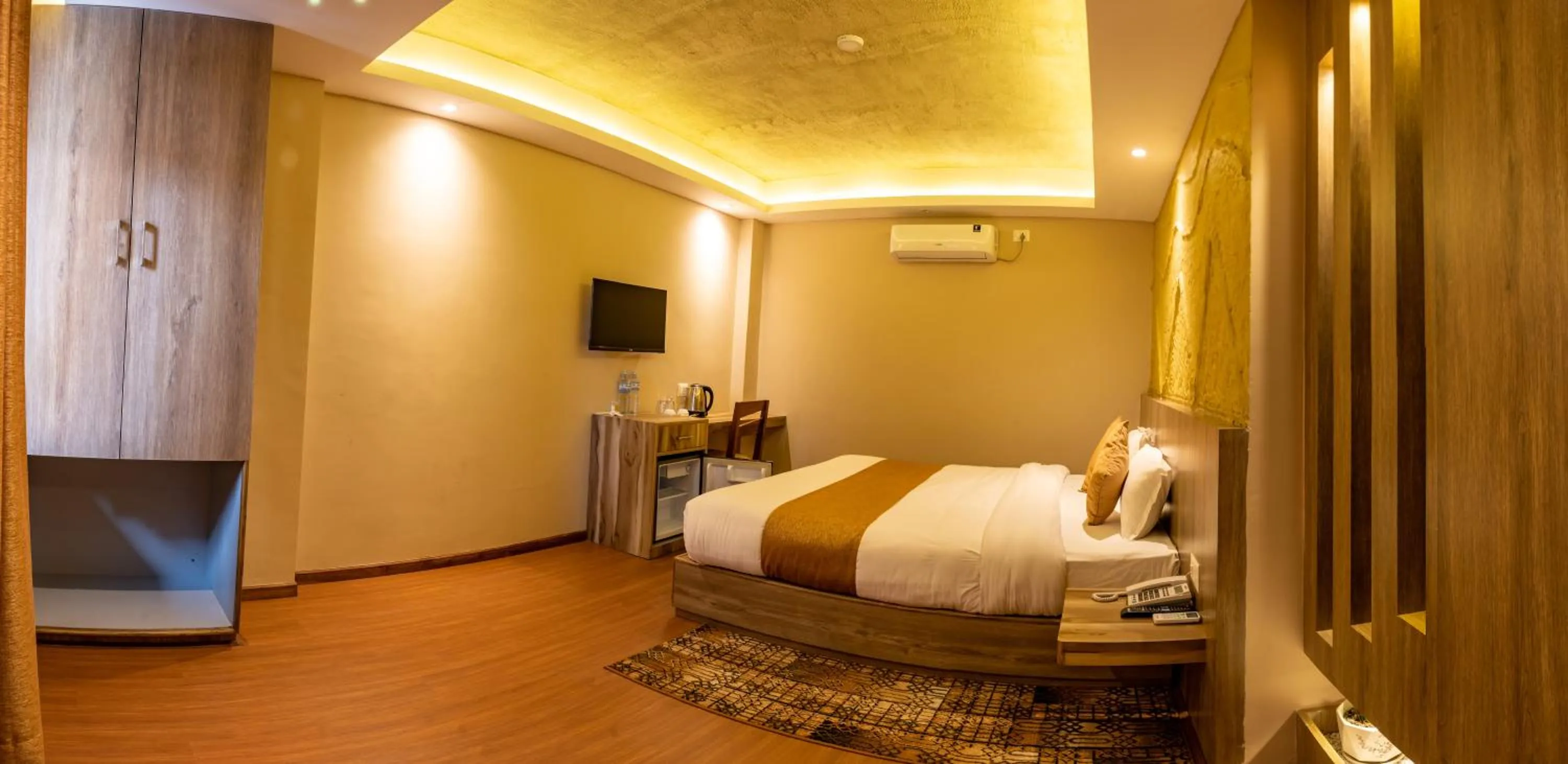 Bed in Divya Boutique Inn