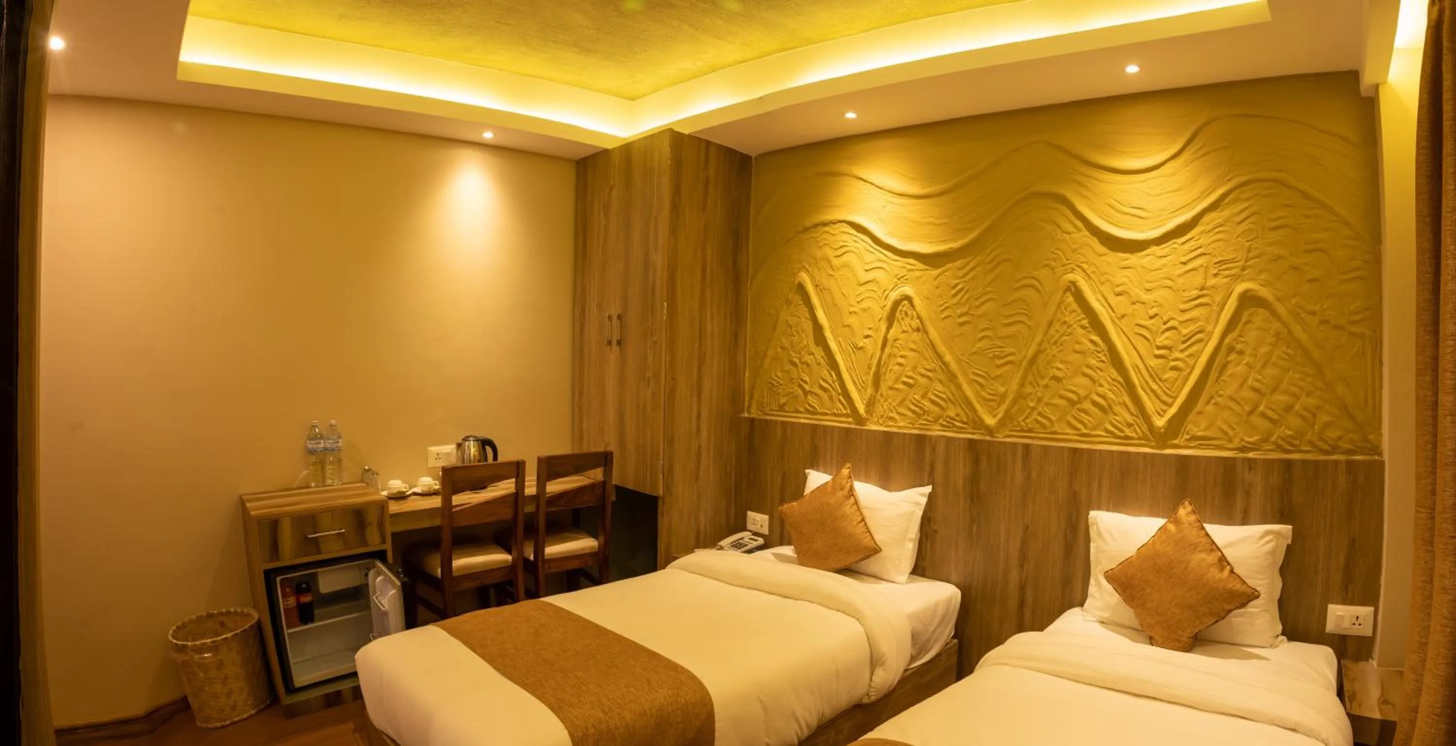 Bed in Divya Boutique Inn