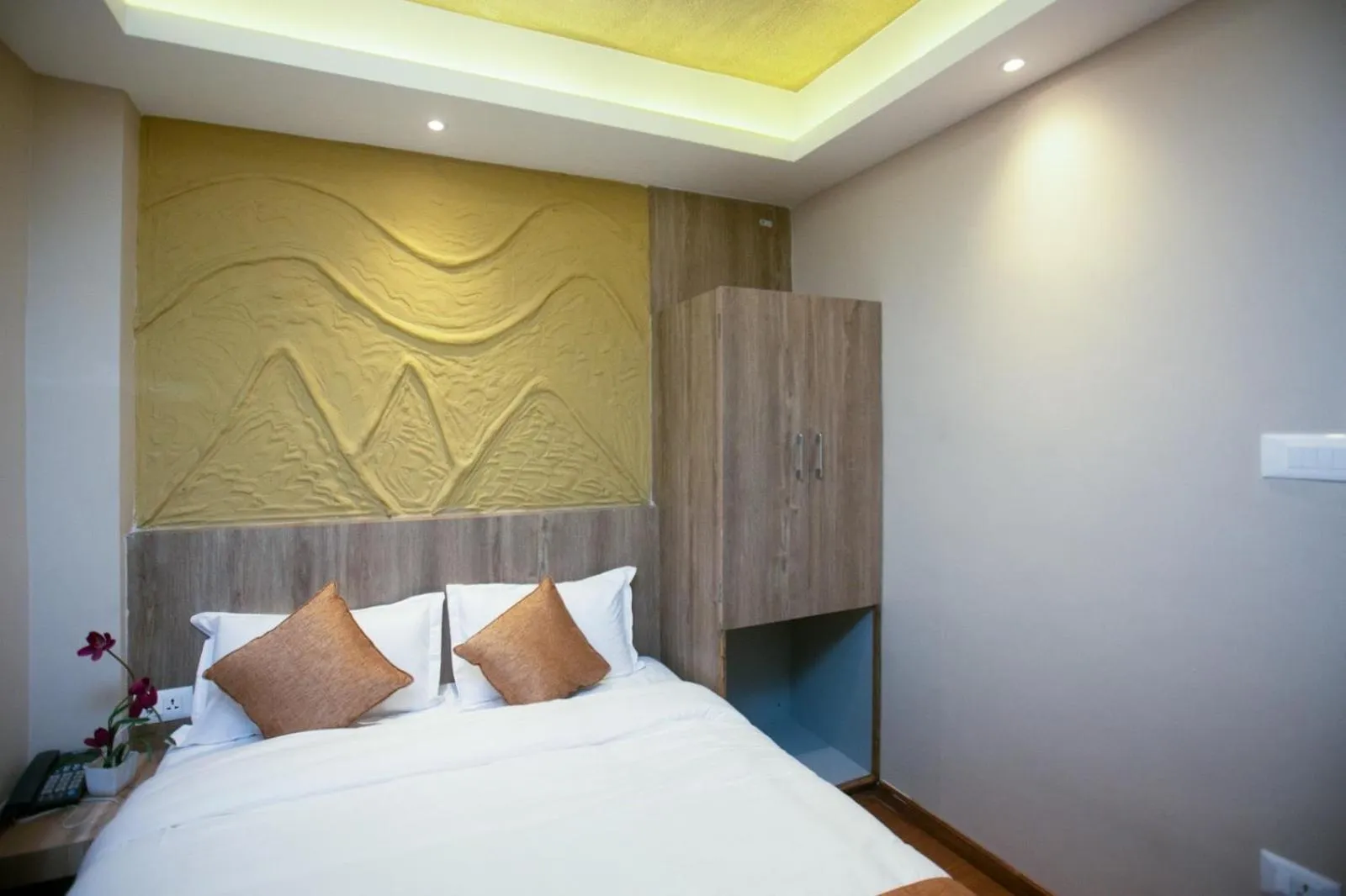 Bed in Divya Boutique Inn