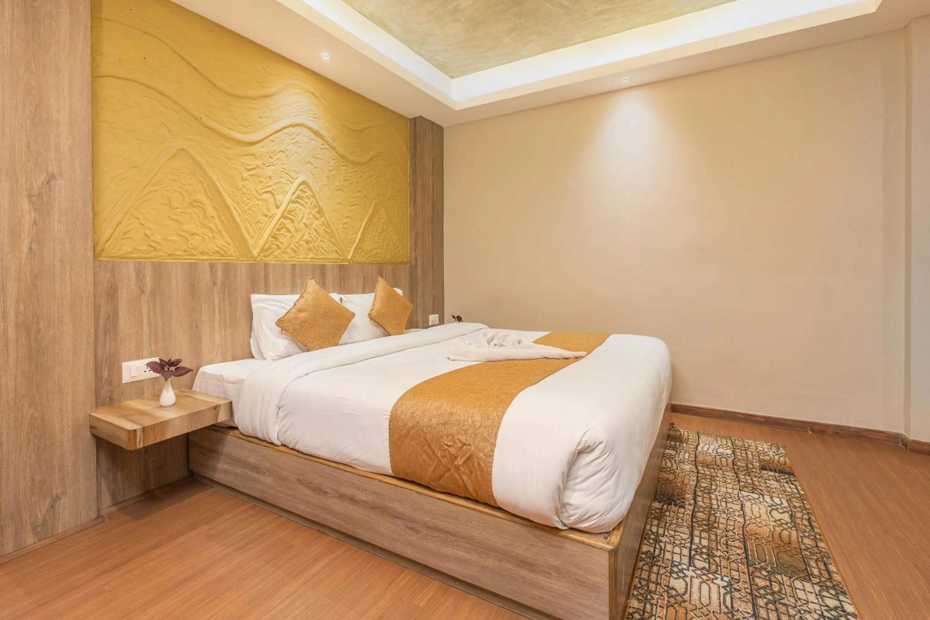 Bed in Divya Boutique Inn