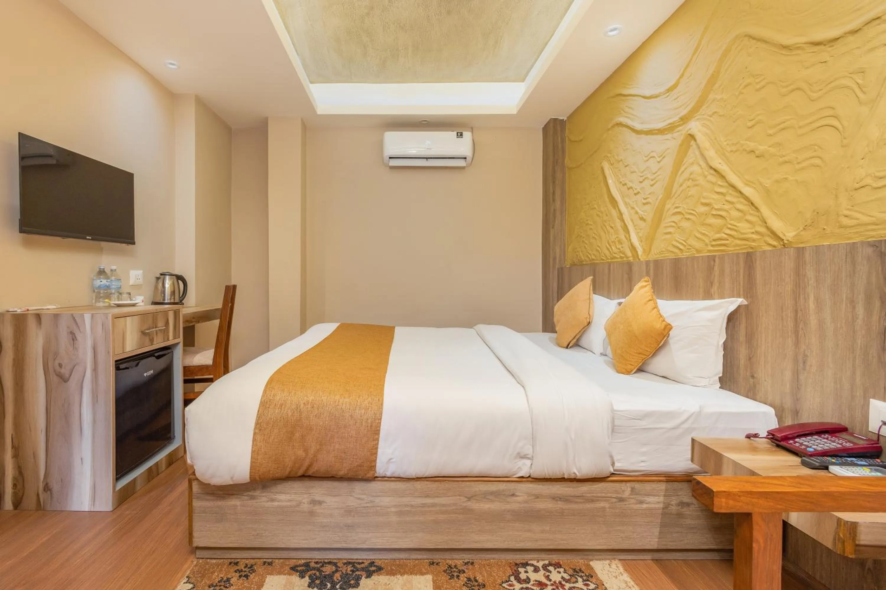 Bed in Divya Boutique Inn