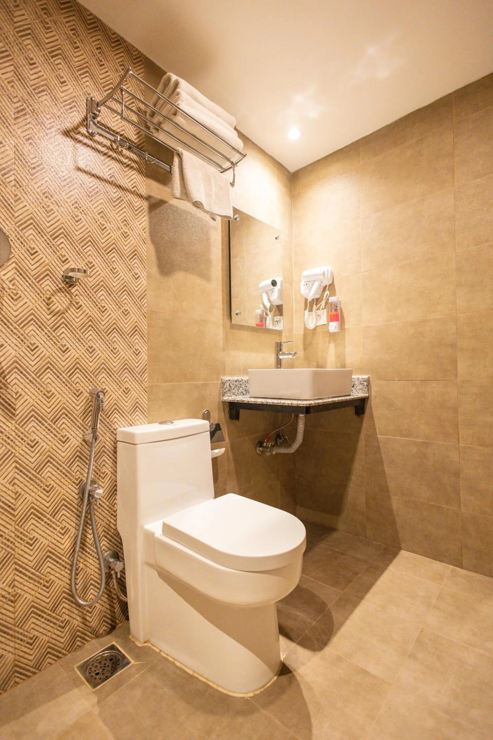 Toilet in Divya Boutique Inn