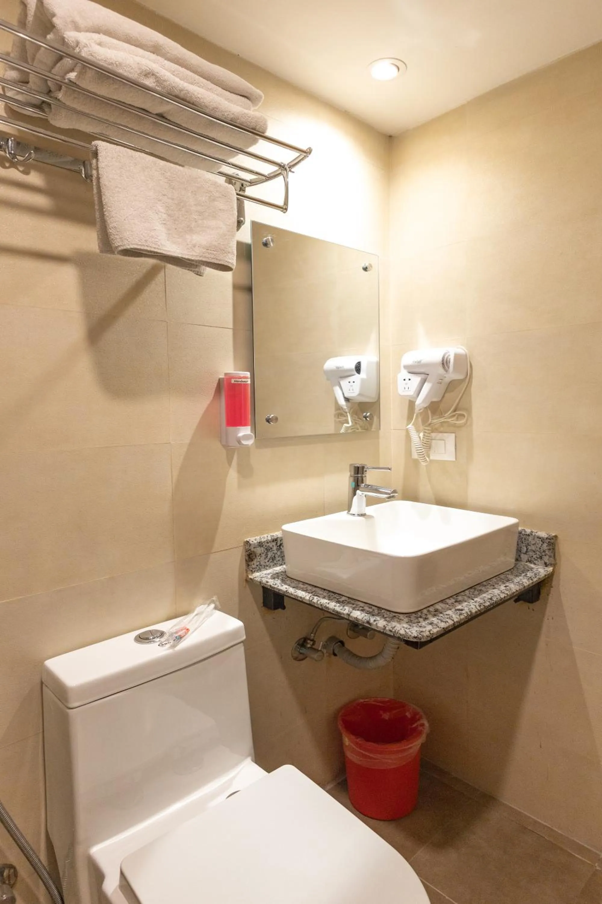 Toilet in Divya Boutique Inn