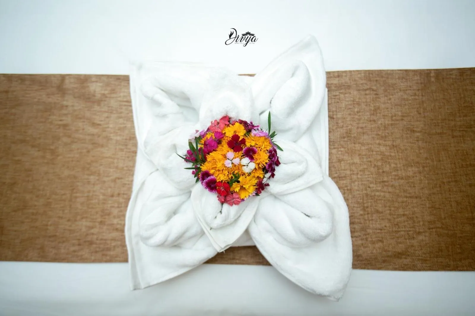 Bed in Divya Boutique Inn