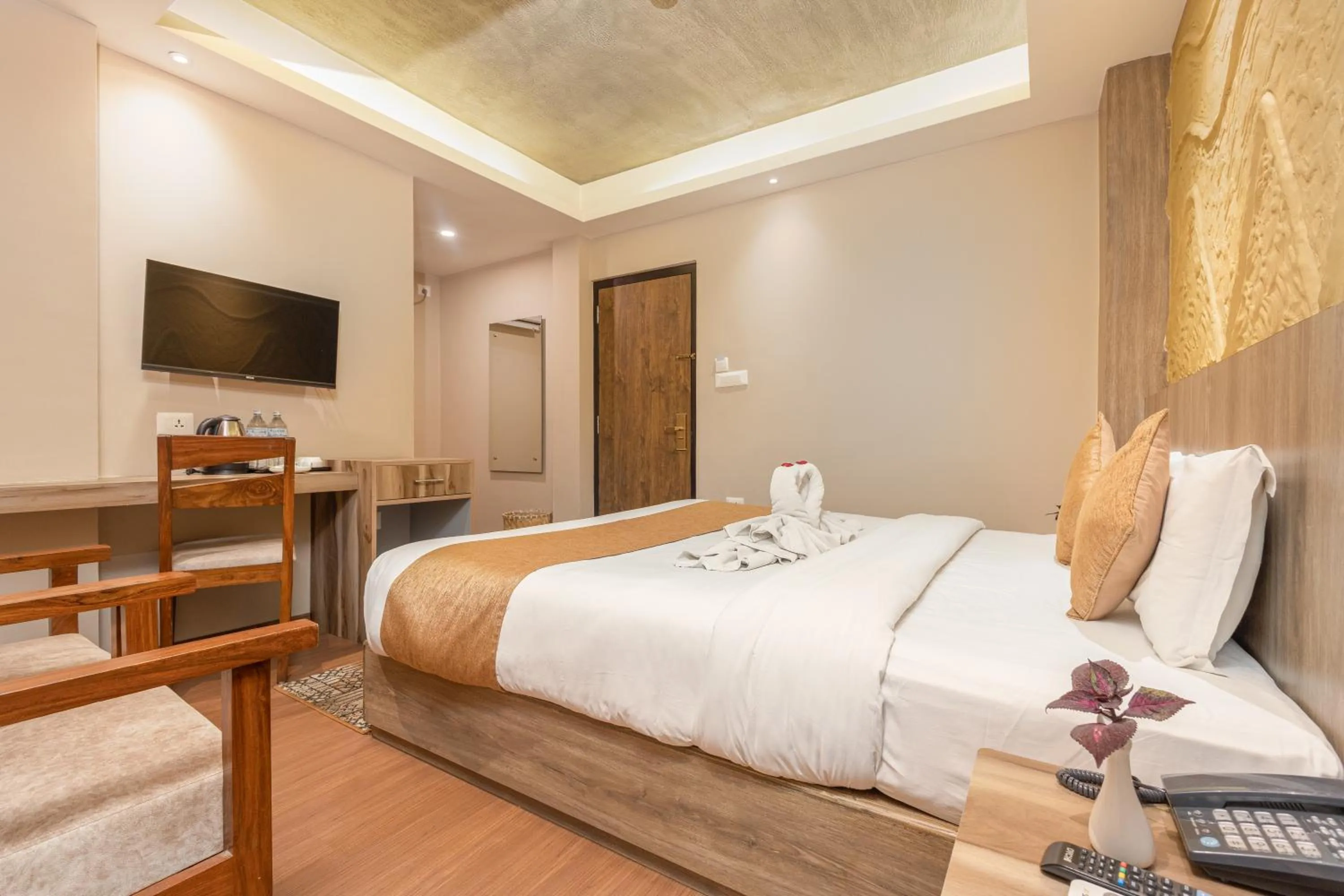 Bed in Divya Boutique Inn