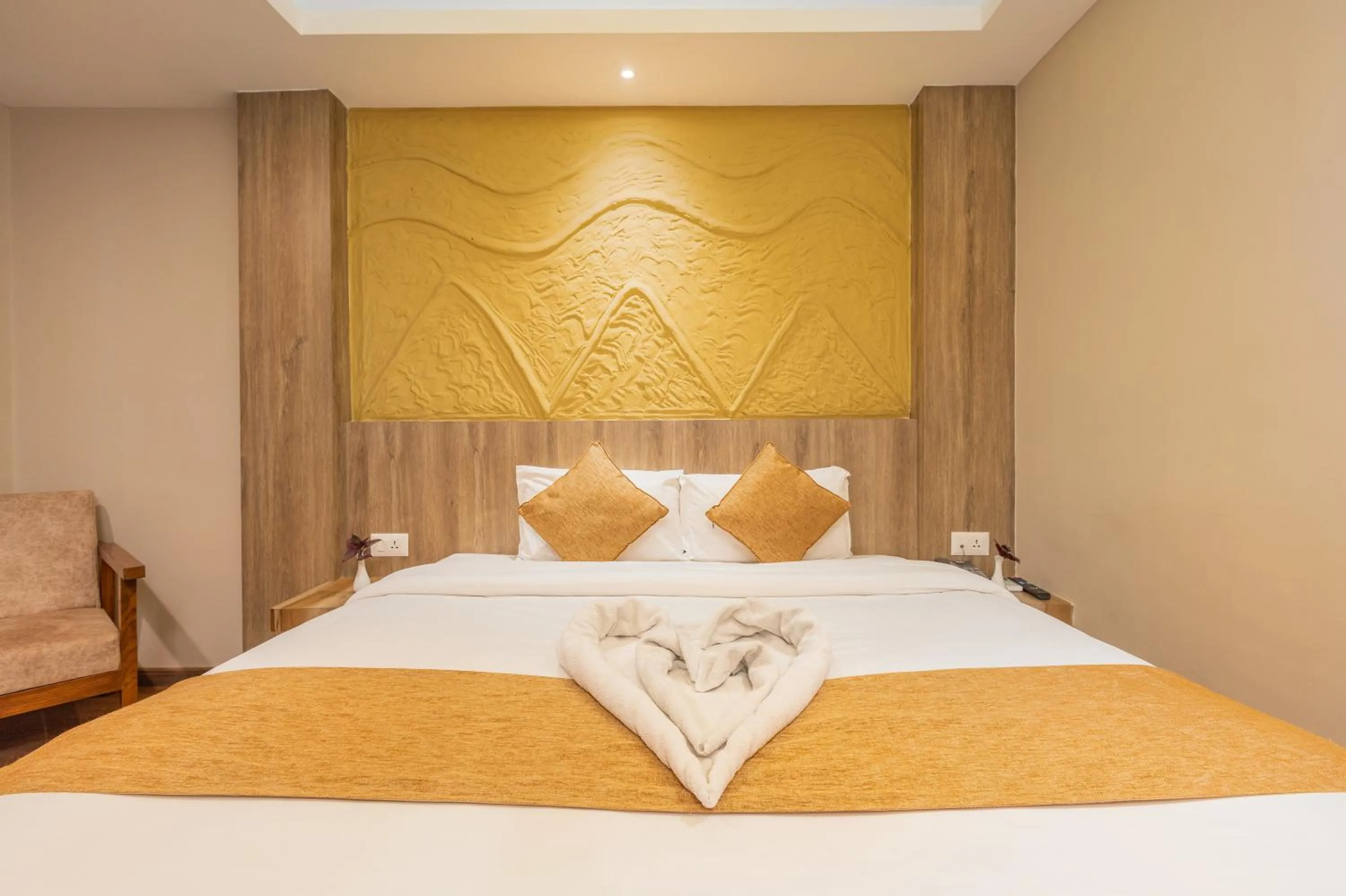 Bed in Divya Boutique Inn