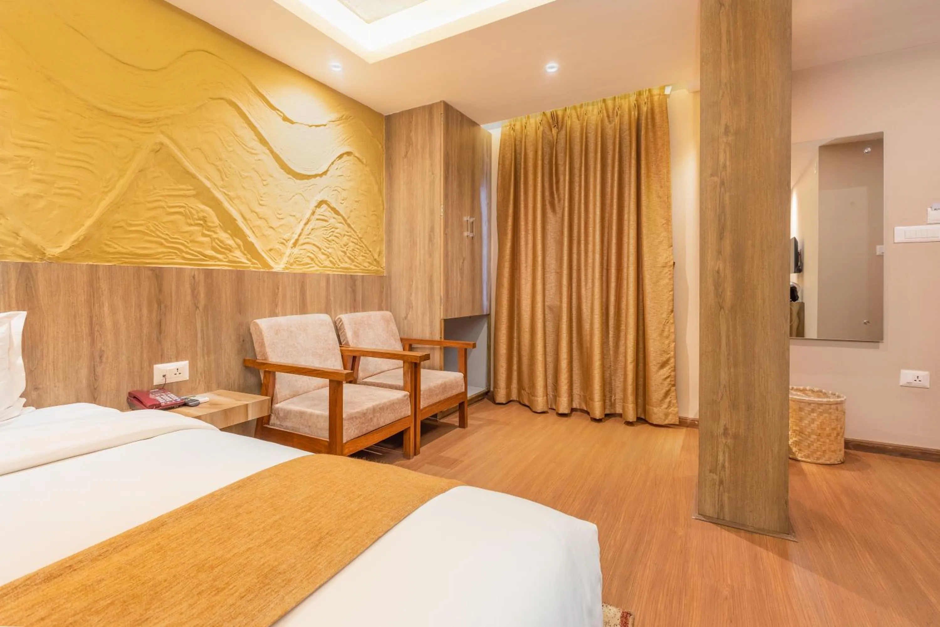 Bed in Divya Boutique Inn