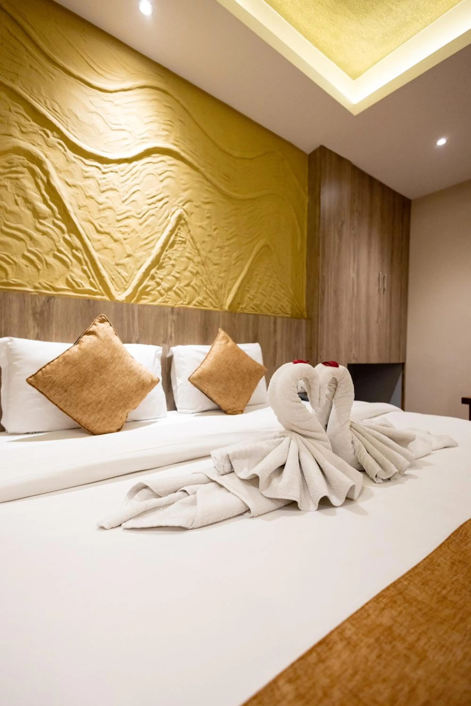 Bed in Divya Boutique Inn