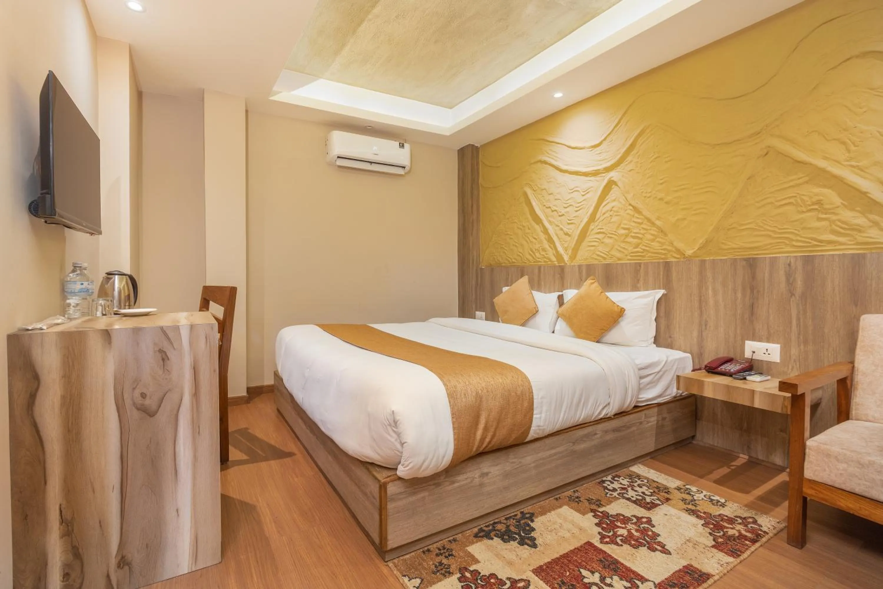 Bed in Divya Boutique Inn