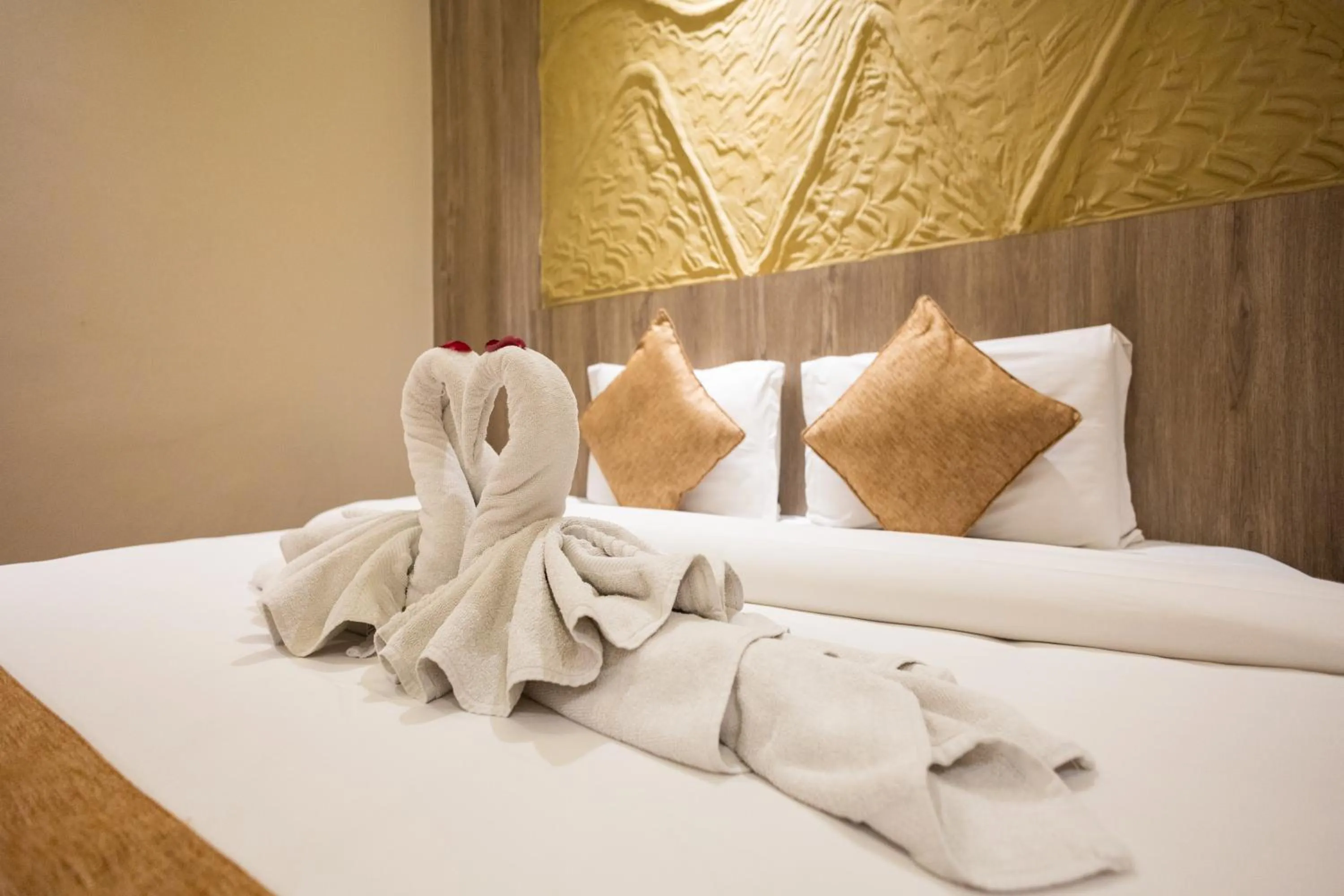 Bed in Divya Boutique Inn