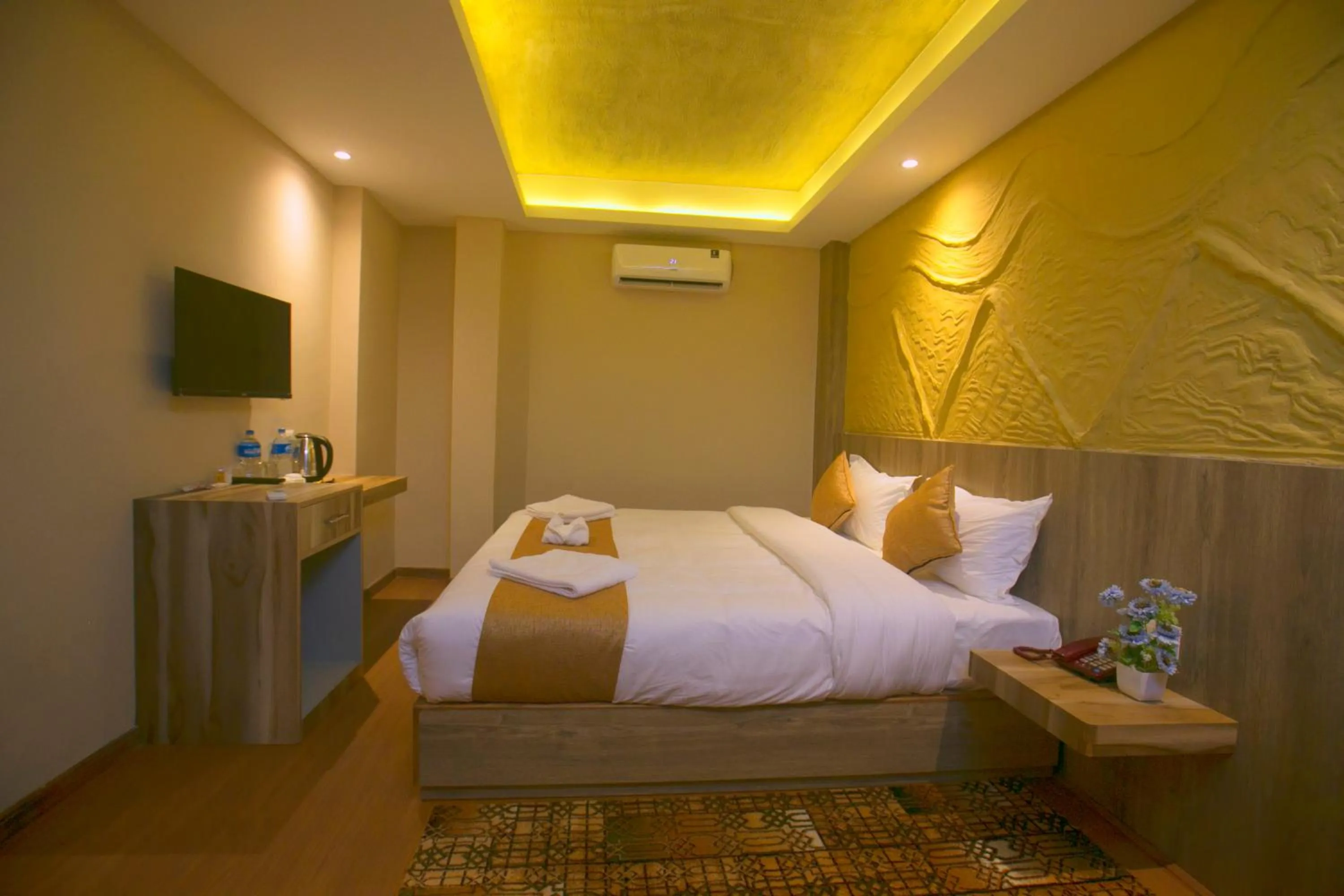 Bed in Divya Boutique Inn