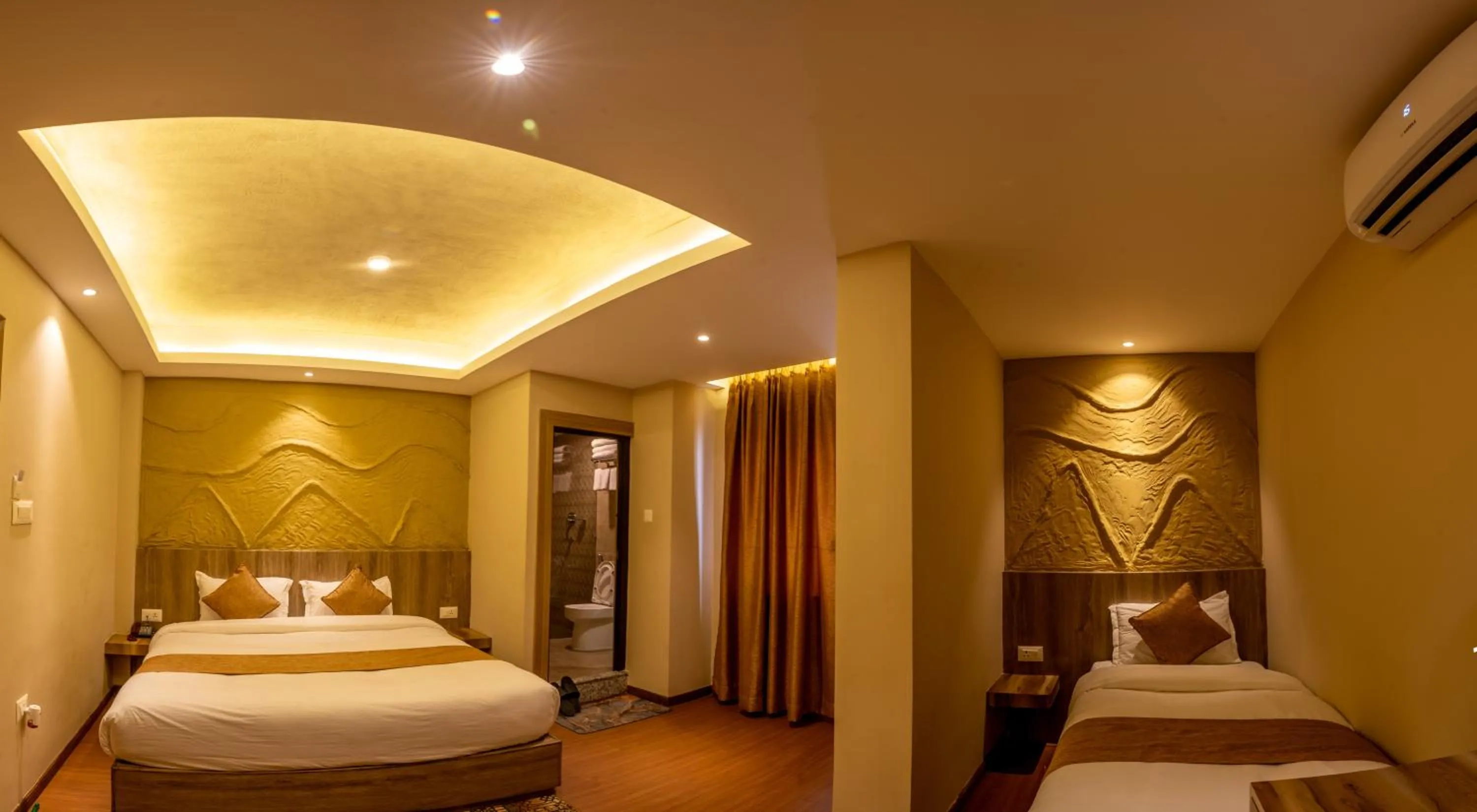 Bed in Divya Boutique Inn