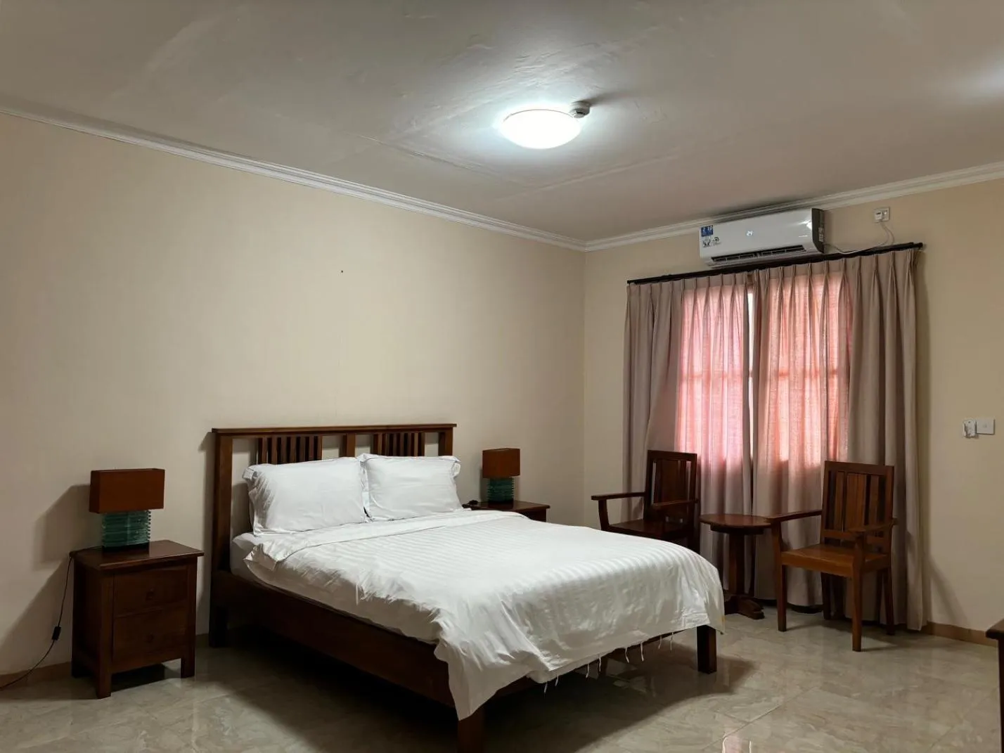 Bed in Palm Malinamoc Hotel