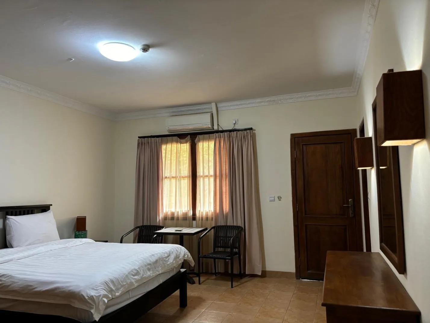 Bed in Palm Malinamoc Hotel