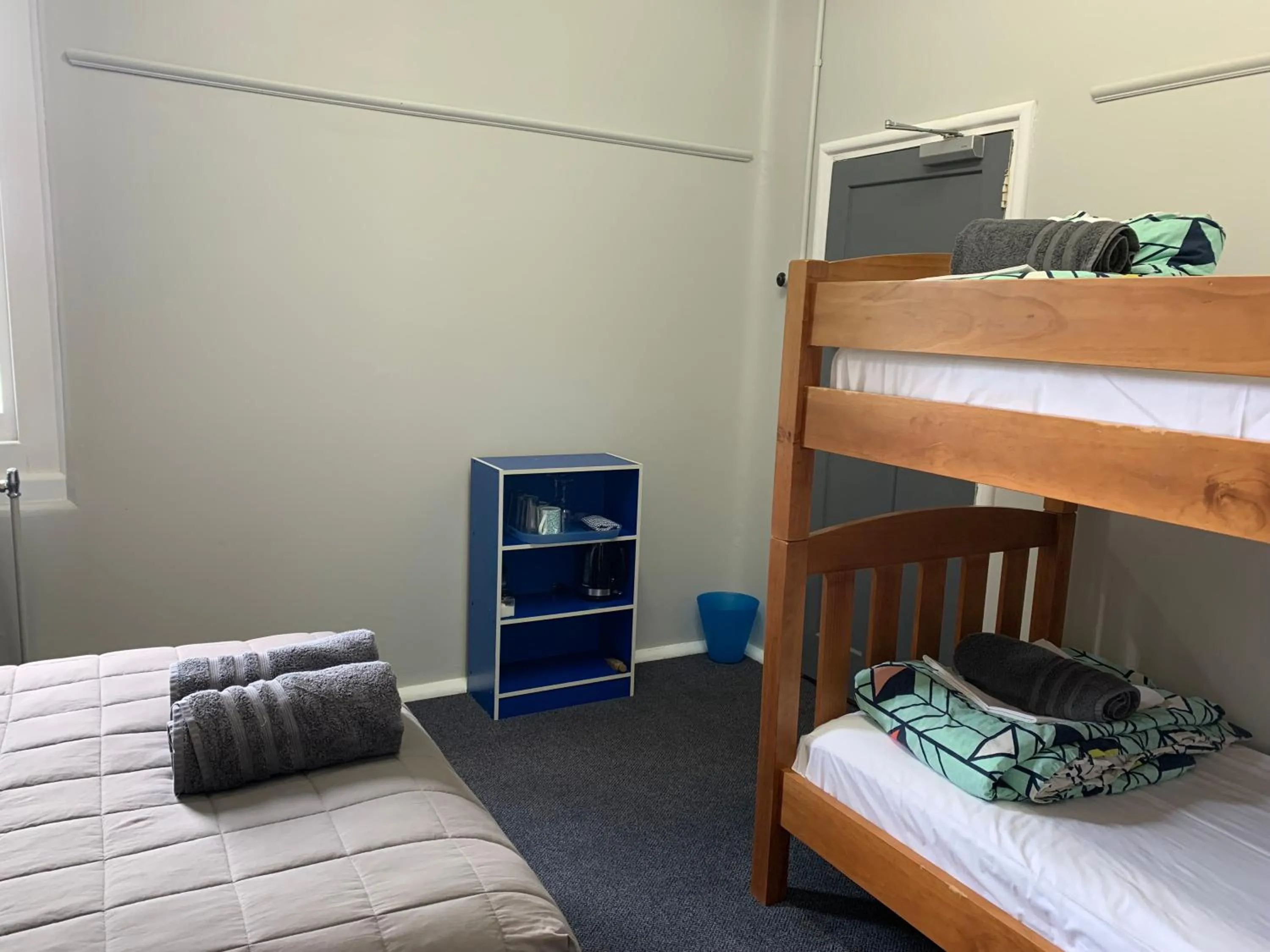 Bed in Thomas's Catlins Lodge and Camp Ground