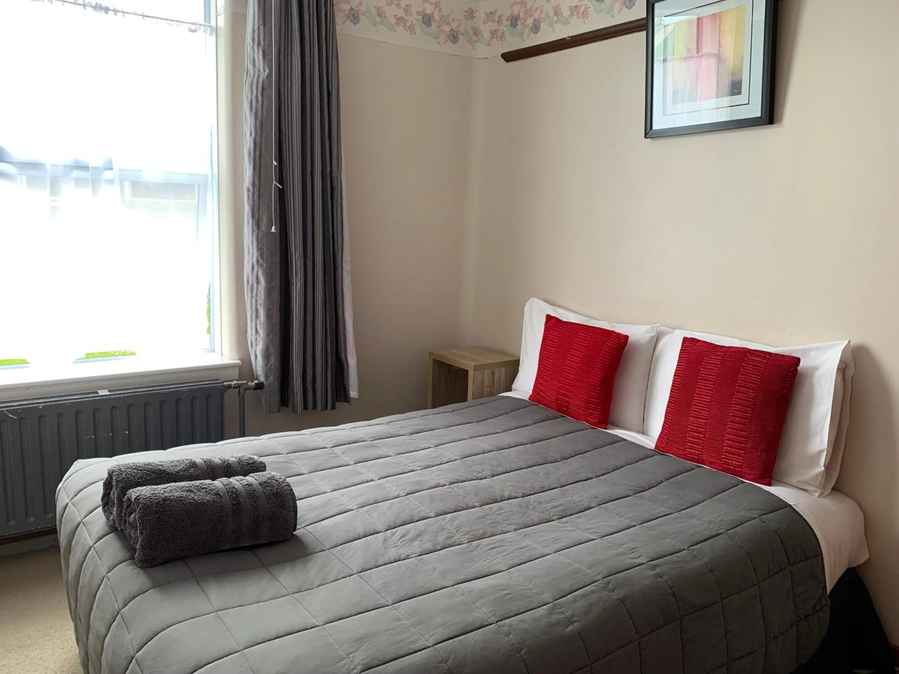 Bed in Thomas's Catlins Lodge and Camp Ground