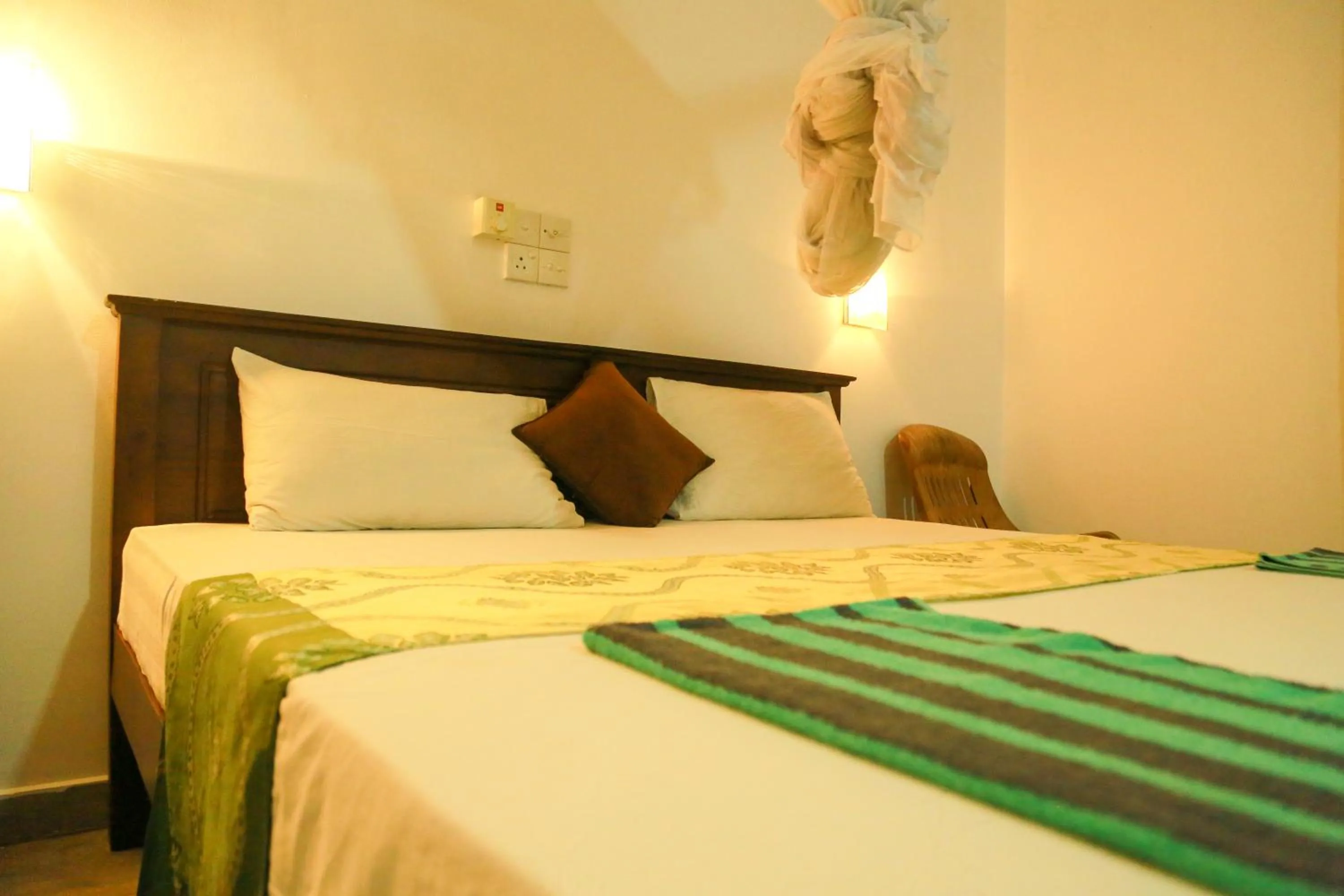 Photo of the whole room, Bed in Suwa Arana Resort