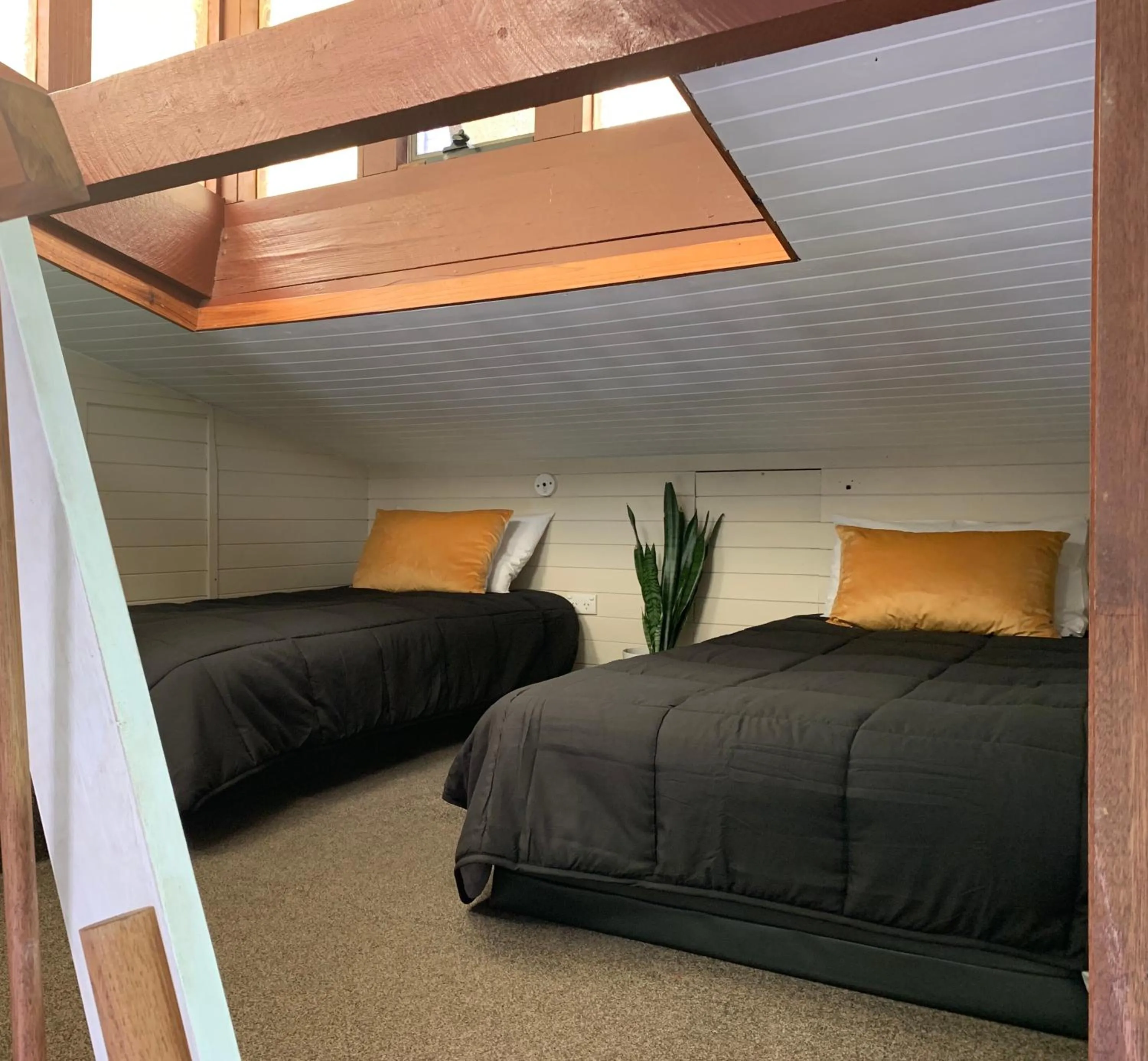 Bed in Montville Holiday Apartments