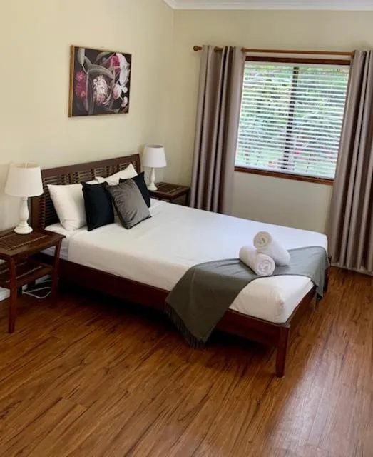 Bed in Montville Holiday Apartments