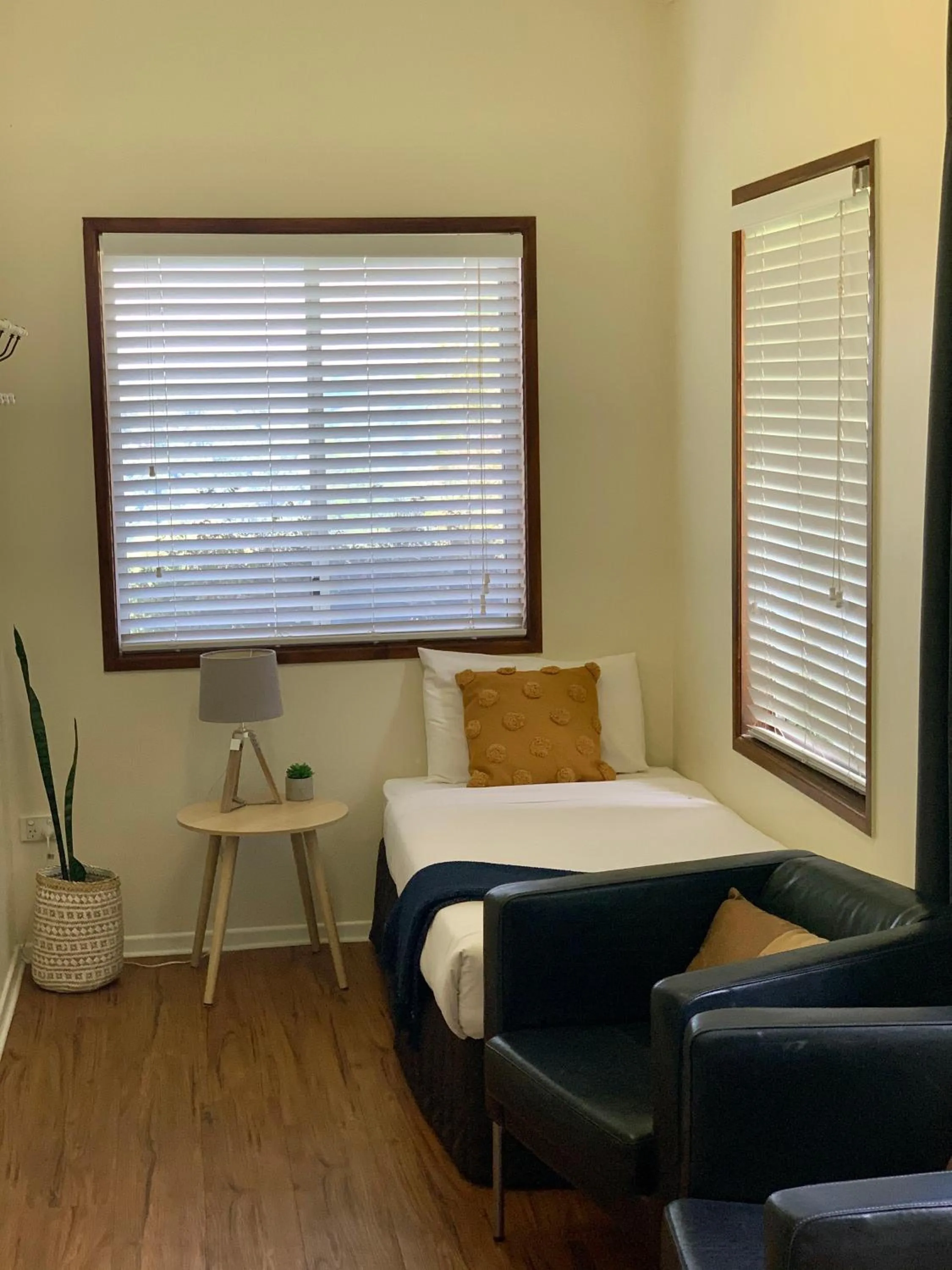 Bed in Montville Holiday Apartments