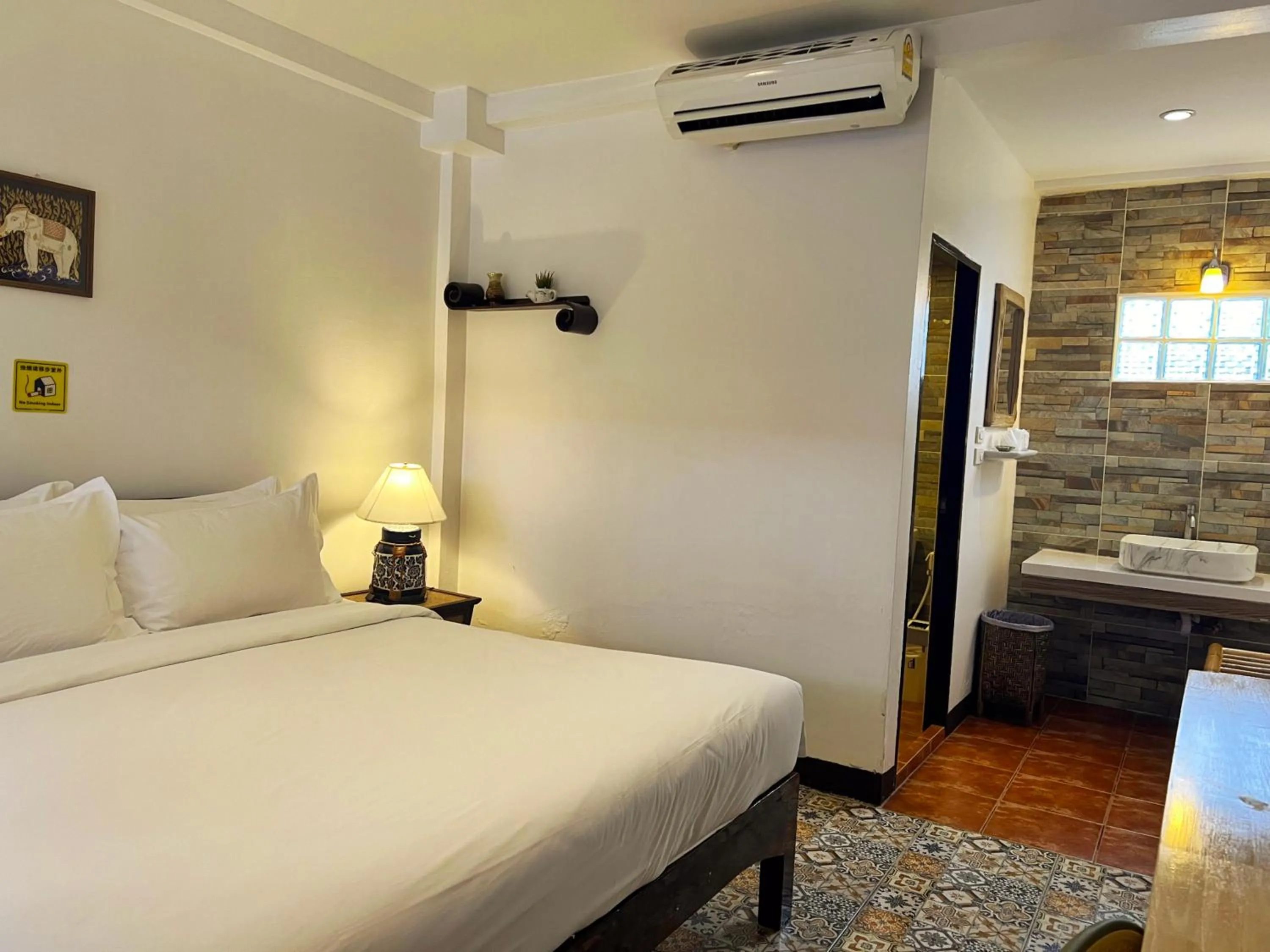 Bed in Somwang Boutique Hotel