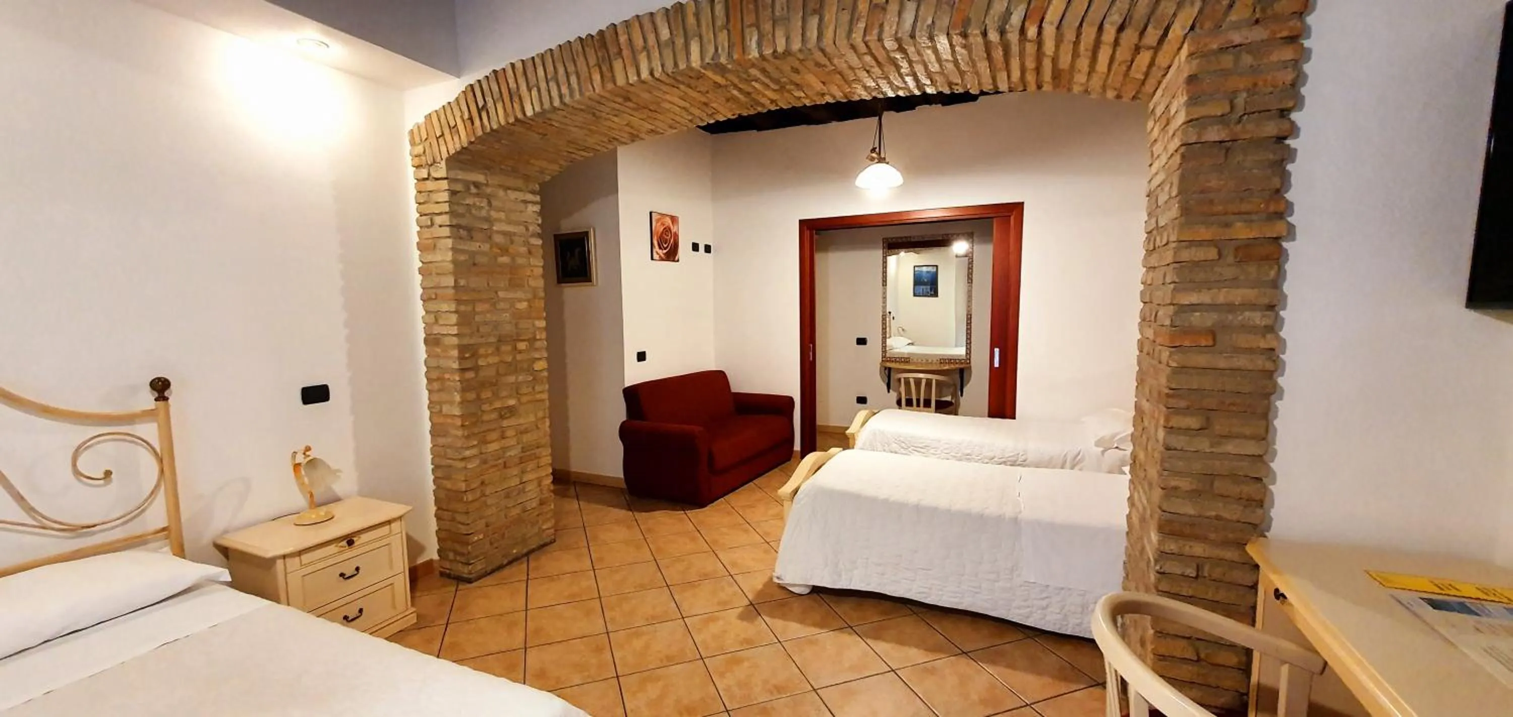 Photo of the whole room, Bed in Sardinia Domus