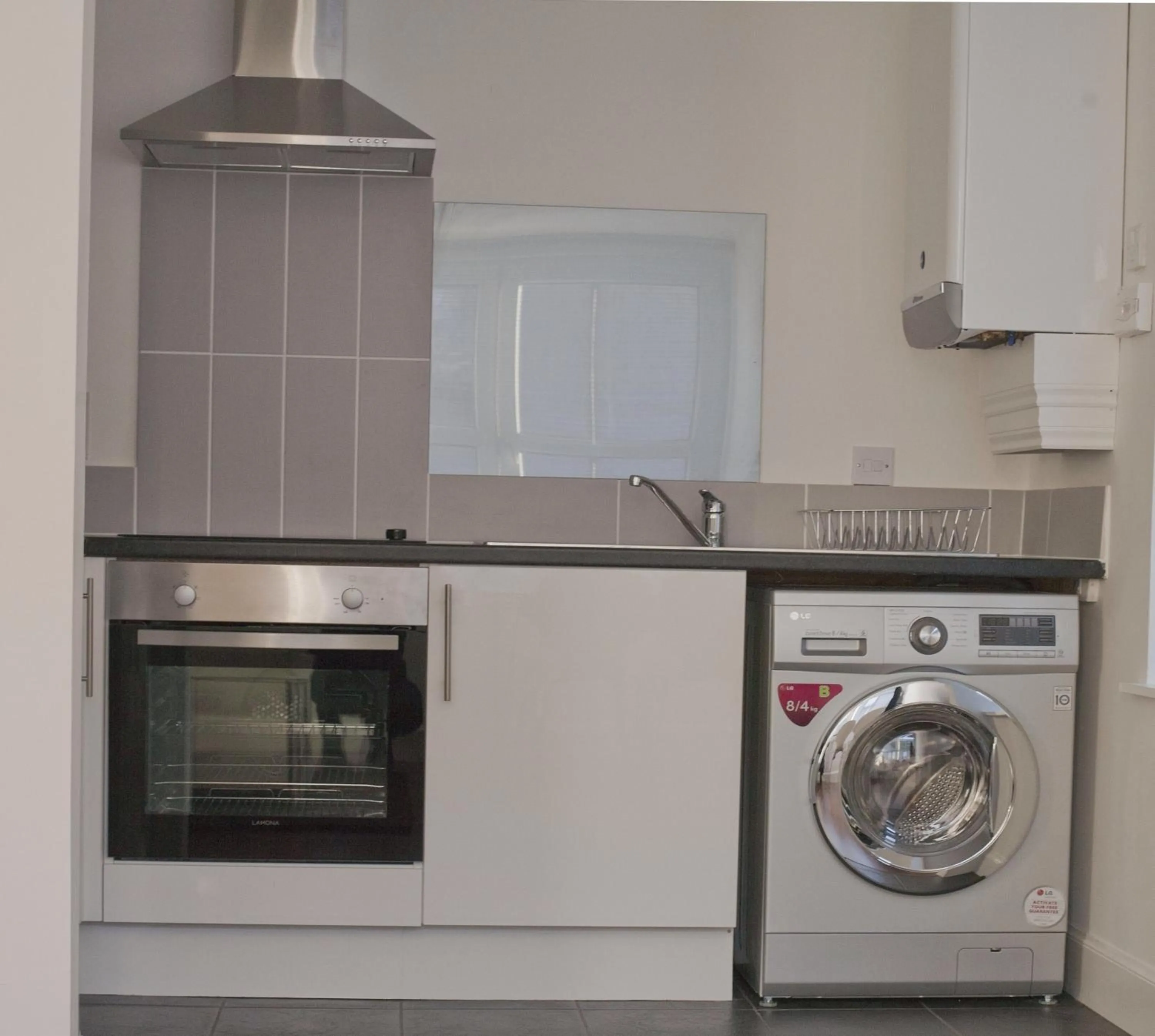 Kitchen or kitchenette in Aberdeen Serviced Apartments: Charlotte street
