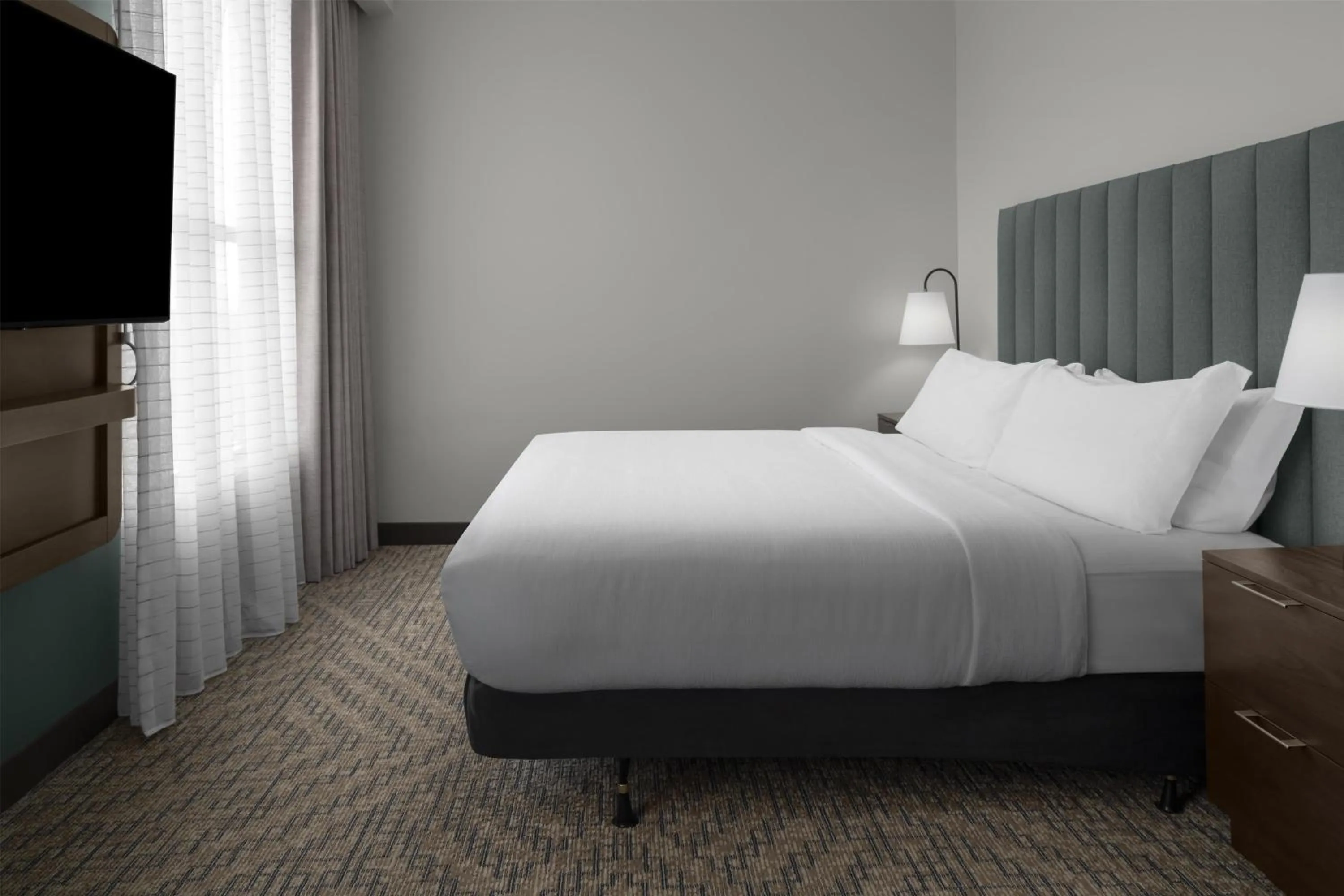 Bed in Embassy Suites by Hilton Tuscaloosa Alabama Downtown