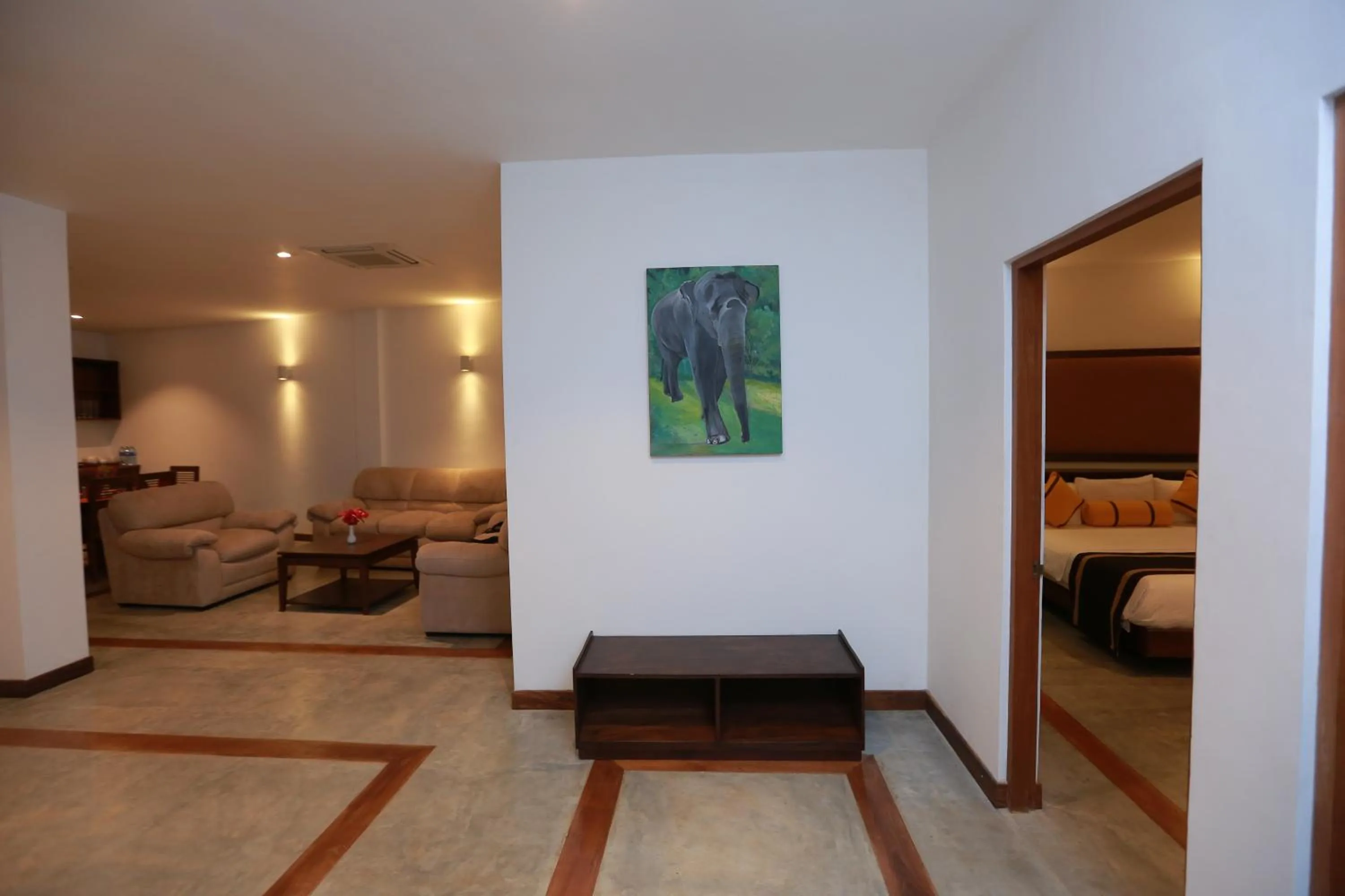 Communal lounge/ TV room, Bed in Refresh Hotel Hikkaduwa
