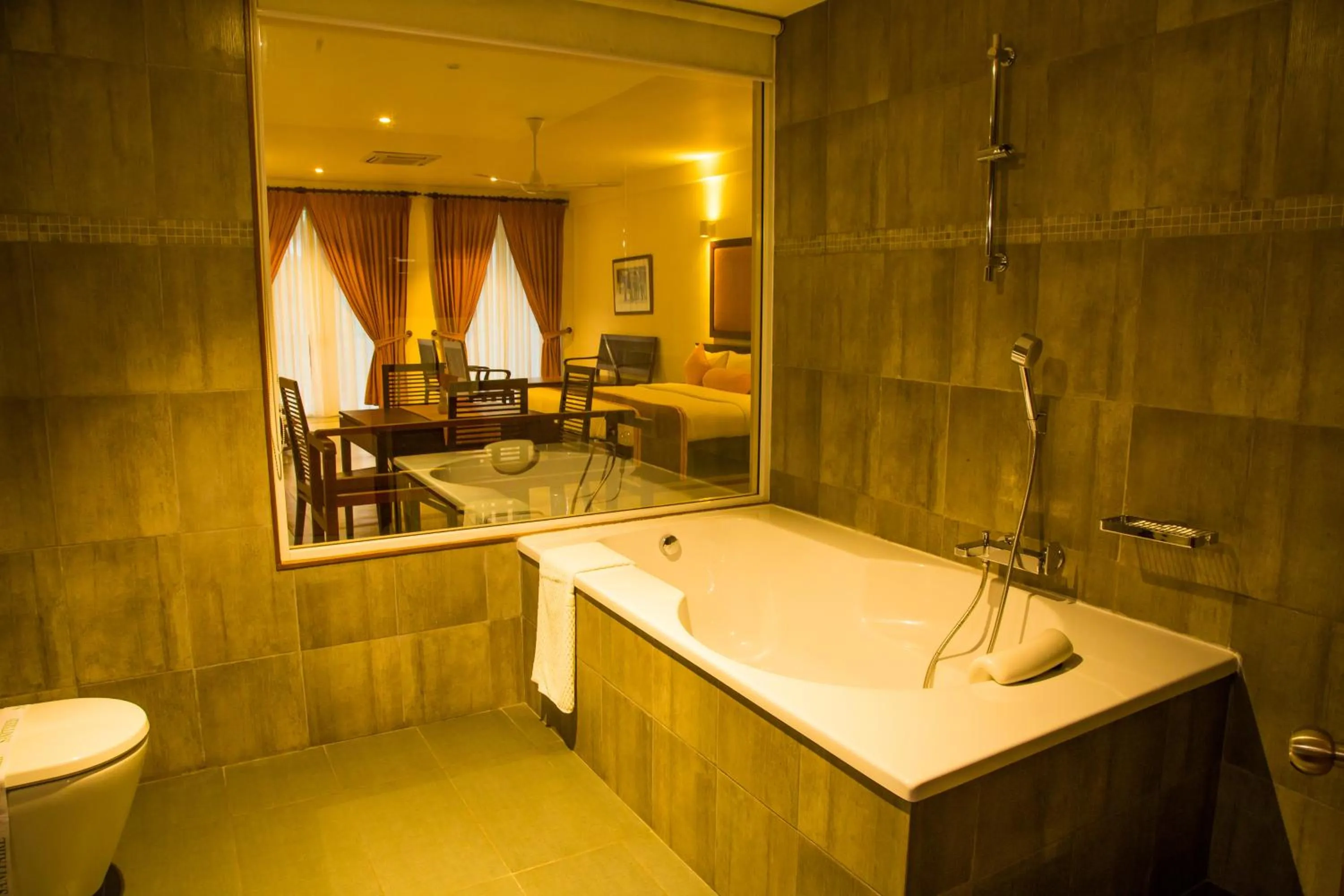 Shower in Refresh Hotel Hikkaduwa