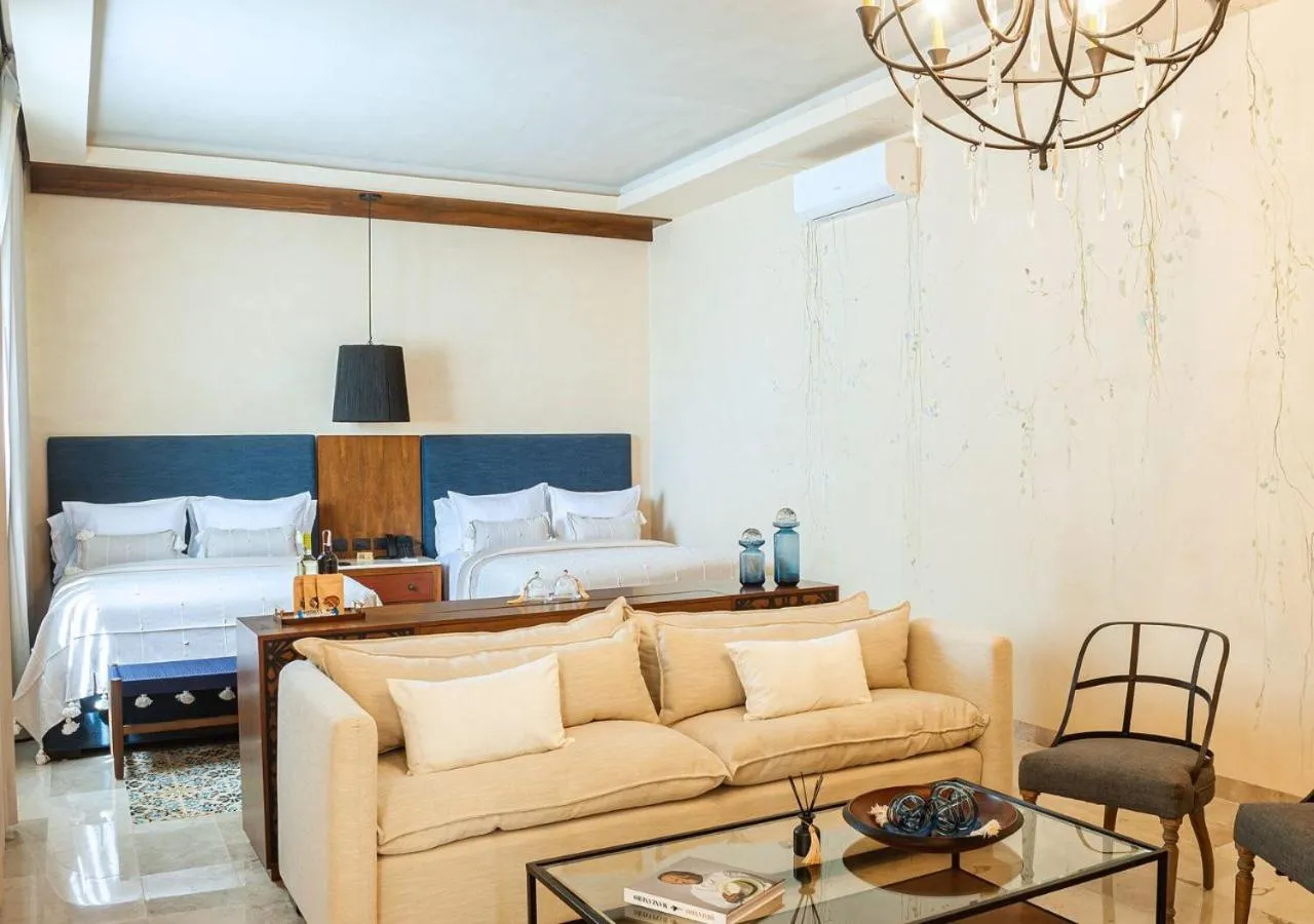 Bed in Adoro Hotel Boutique