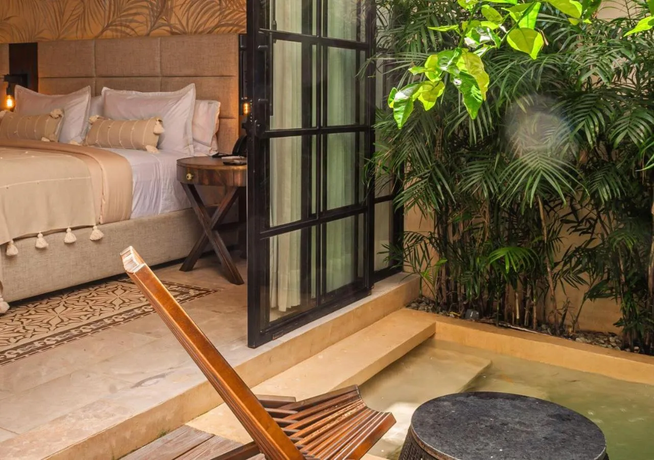 Bed in Adoro Hotel Boutique