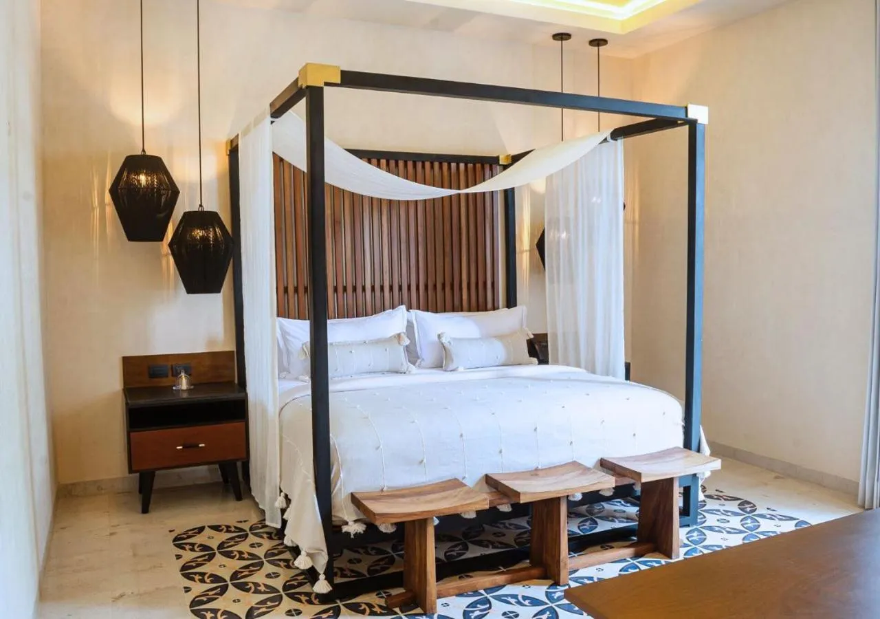 Bed in Adoro Hotel Boutique