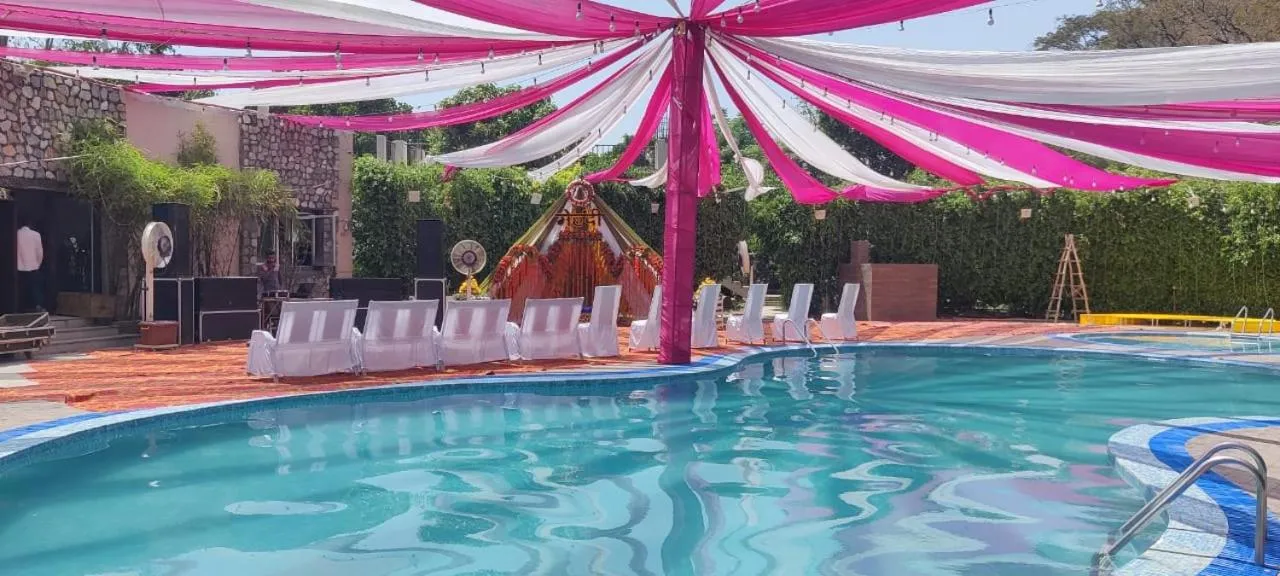 Swimming pool in Click Resort Corbett Tiger Den