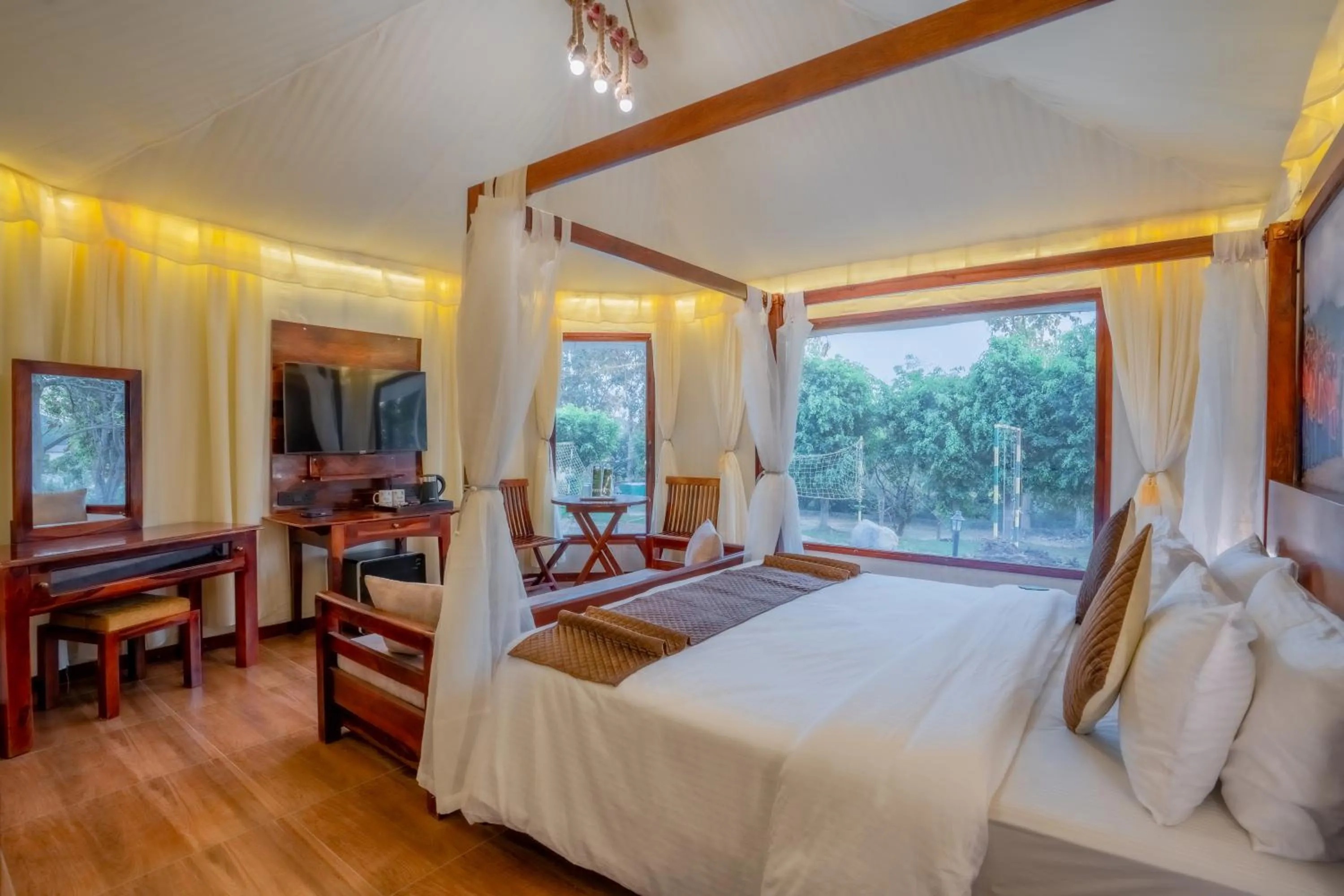 Bed in Click Resort Corbett Tiger Den