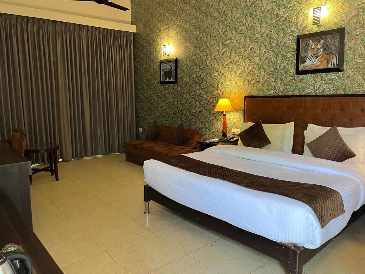 Bed in Click Resort Corbett Tiger Den