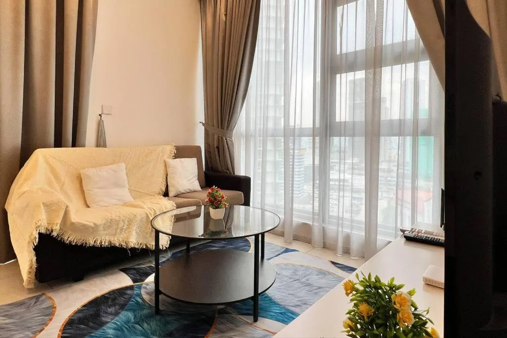 Living room in The Robertson Bukit Bintang by DeUrban