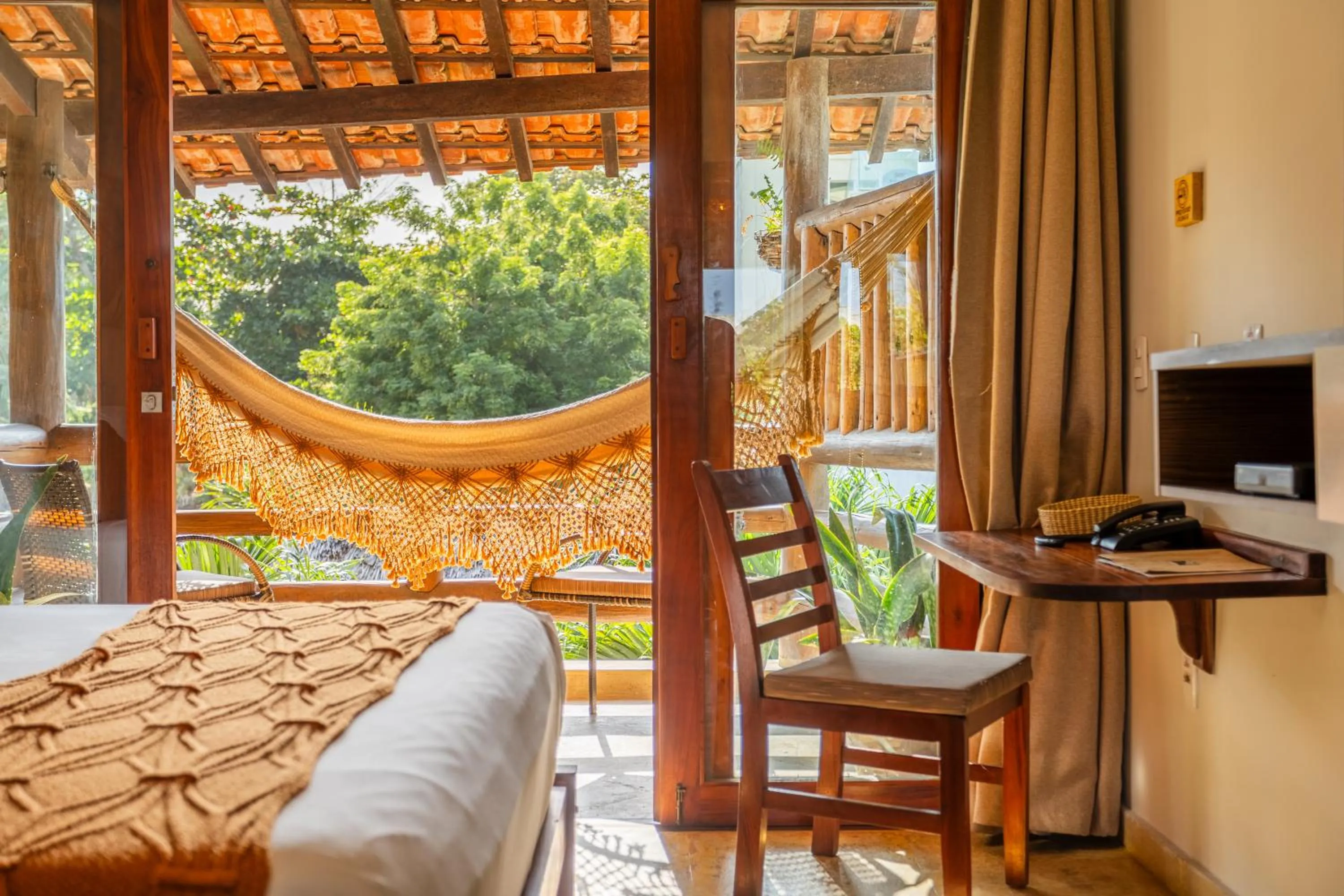 Bed in Pousada Carcará