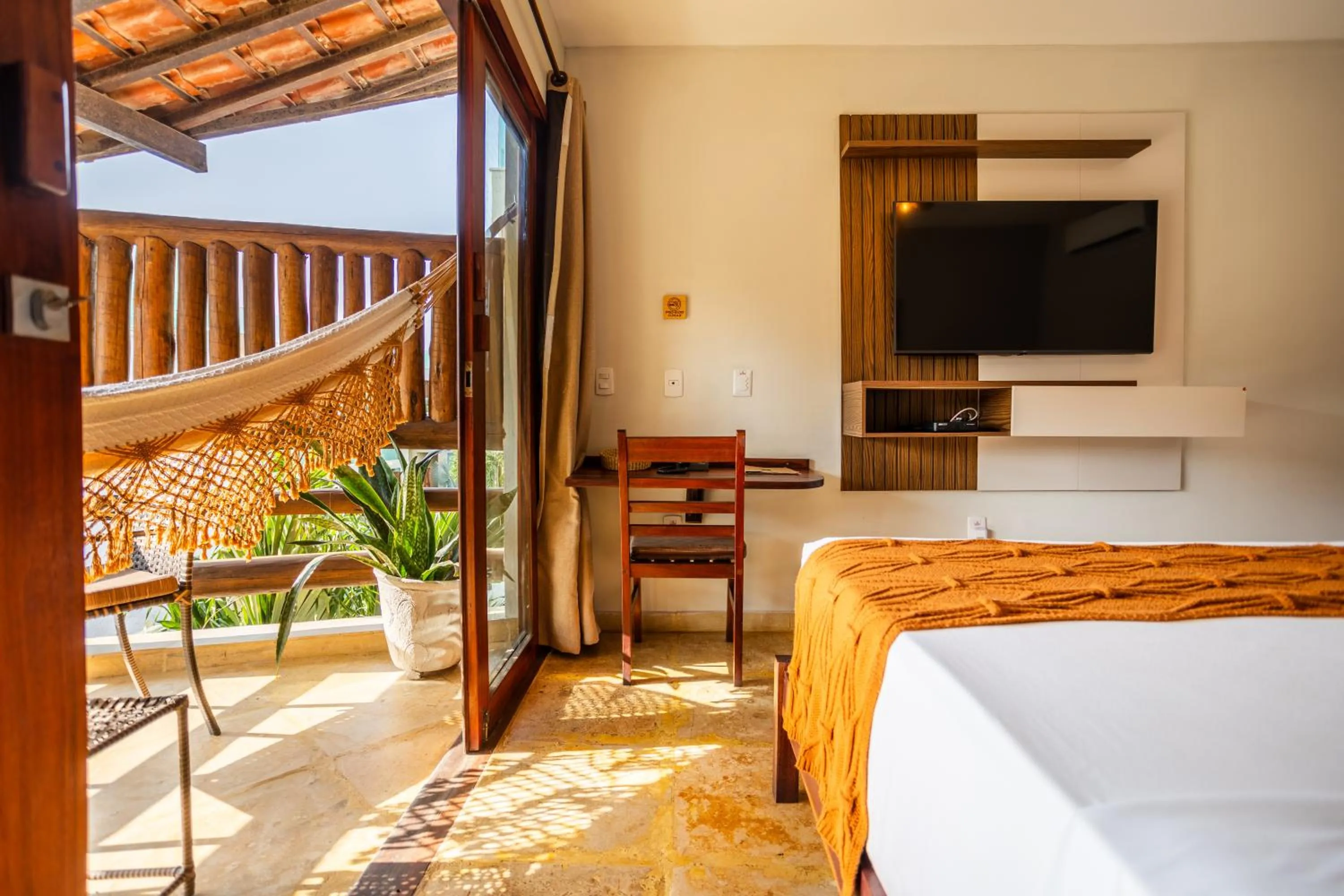 Bed in Pousada Carcará