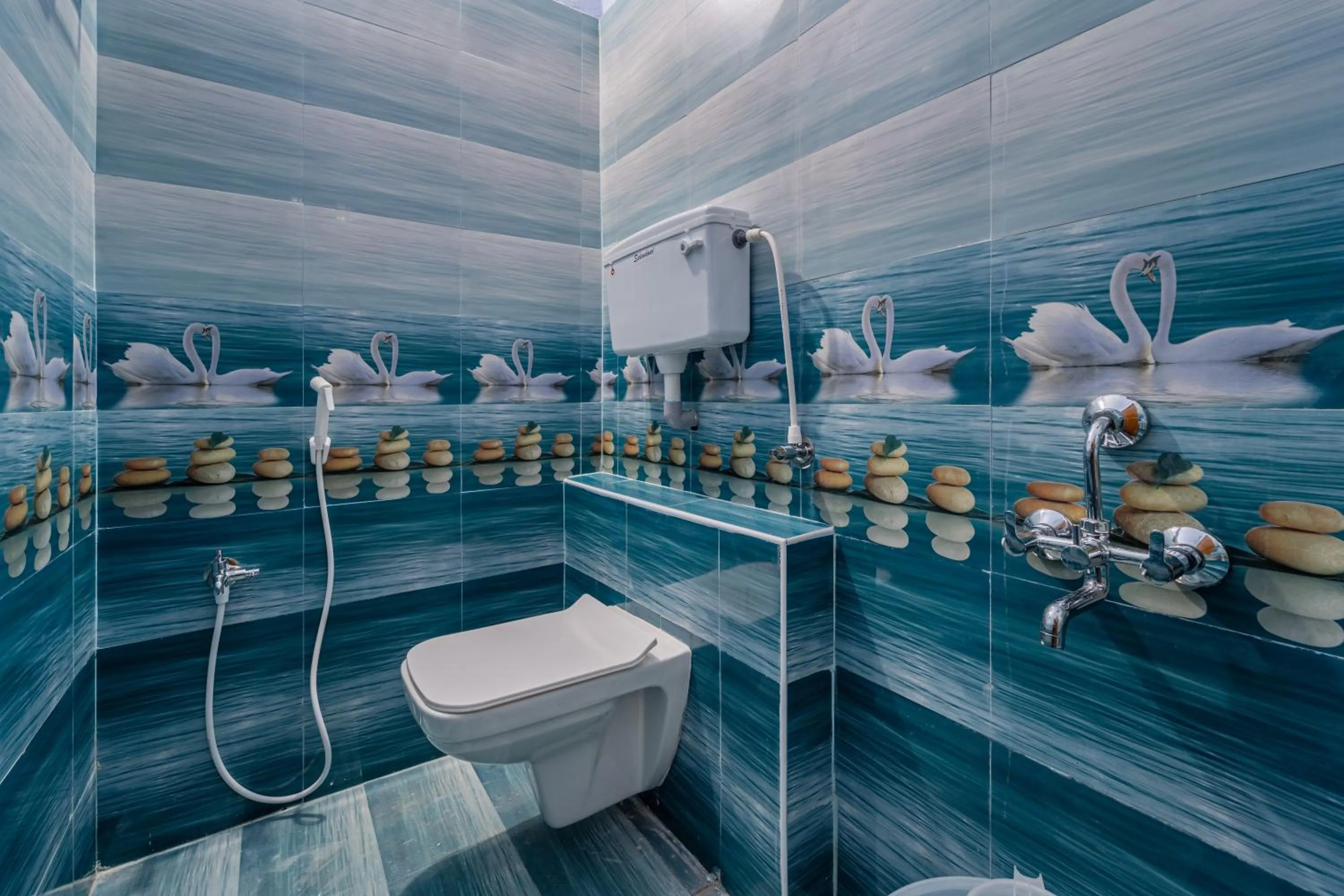 Shower in Hotel De Jardin Pondicherry with Swimming Pool