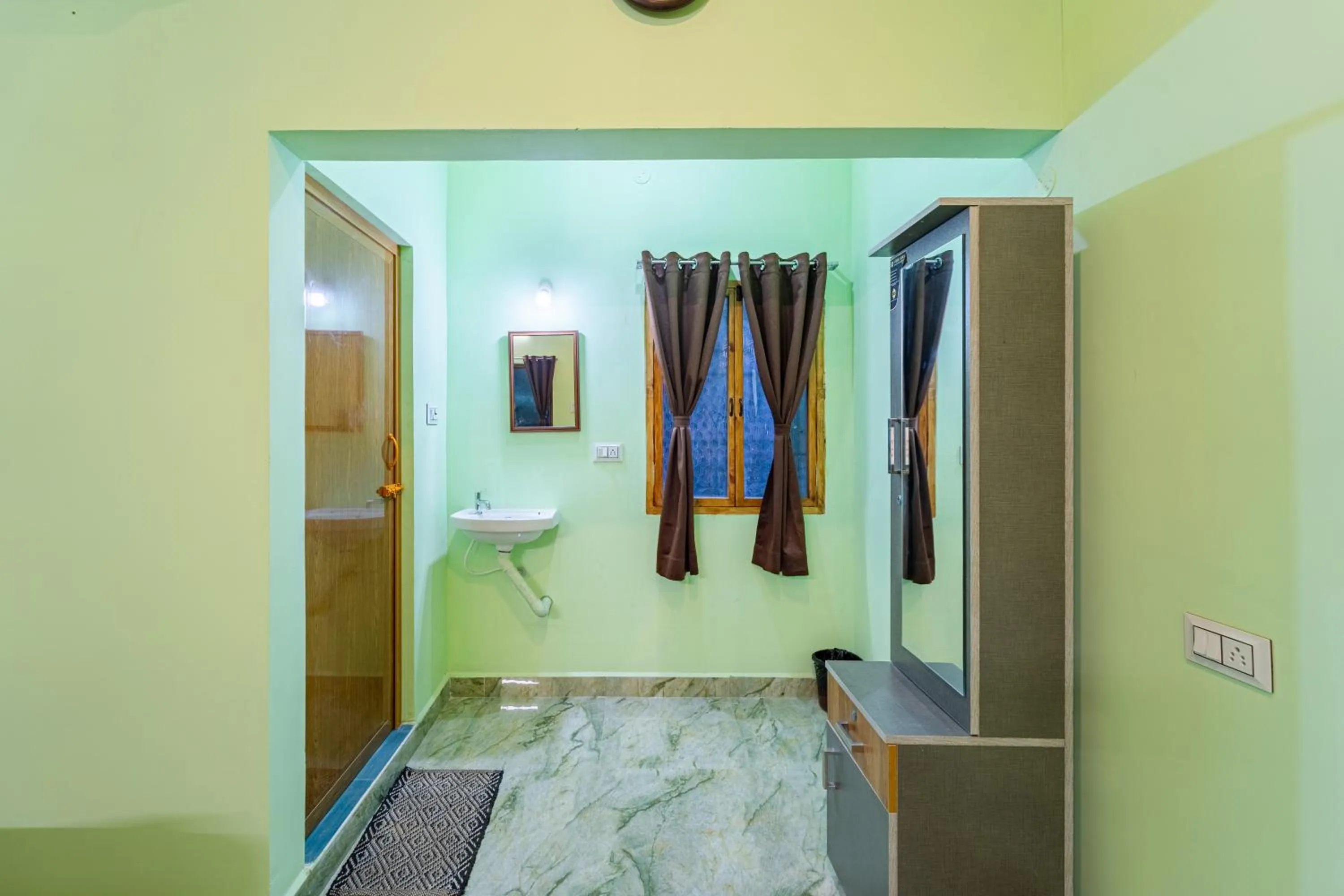 Bedroom in Hotel De Jardin Pondicherry with Swimming Pool