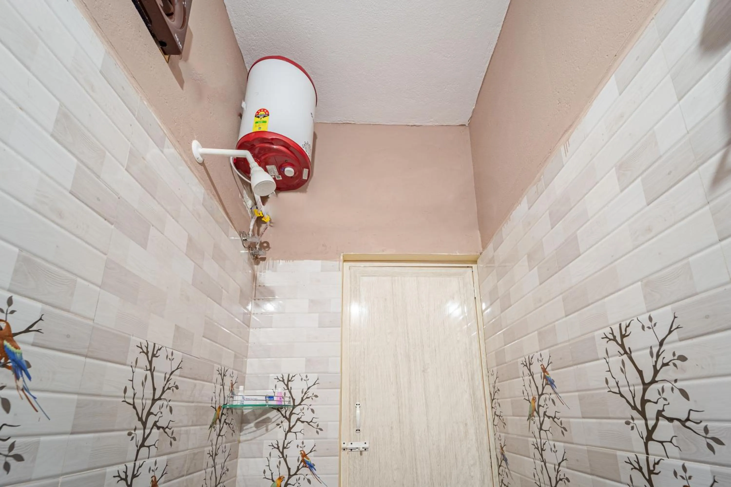 Shower in Hotel De Jardin Pondicherry with Swimming Pool