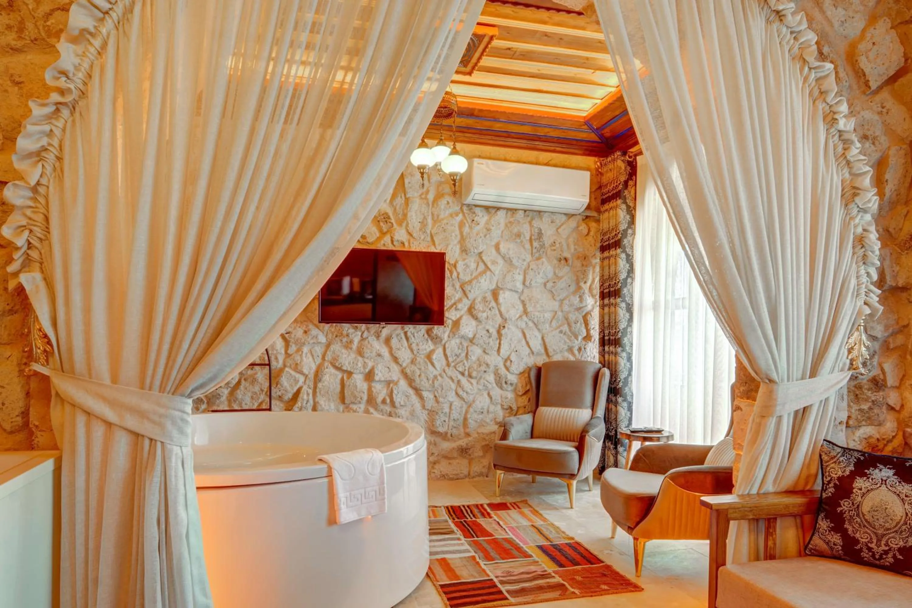 Seating area in Kasr-ı Kapadokya Cave Suites