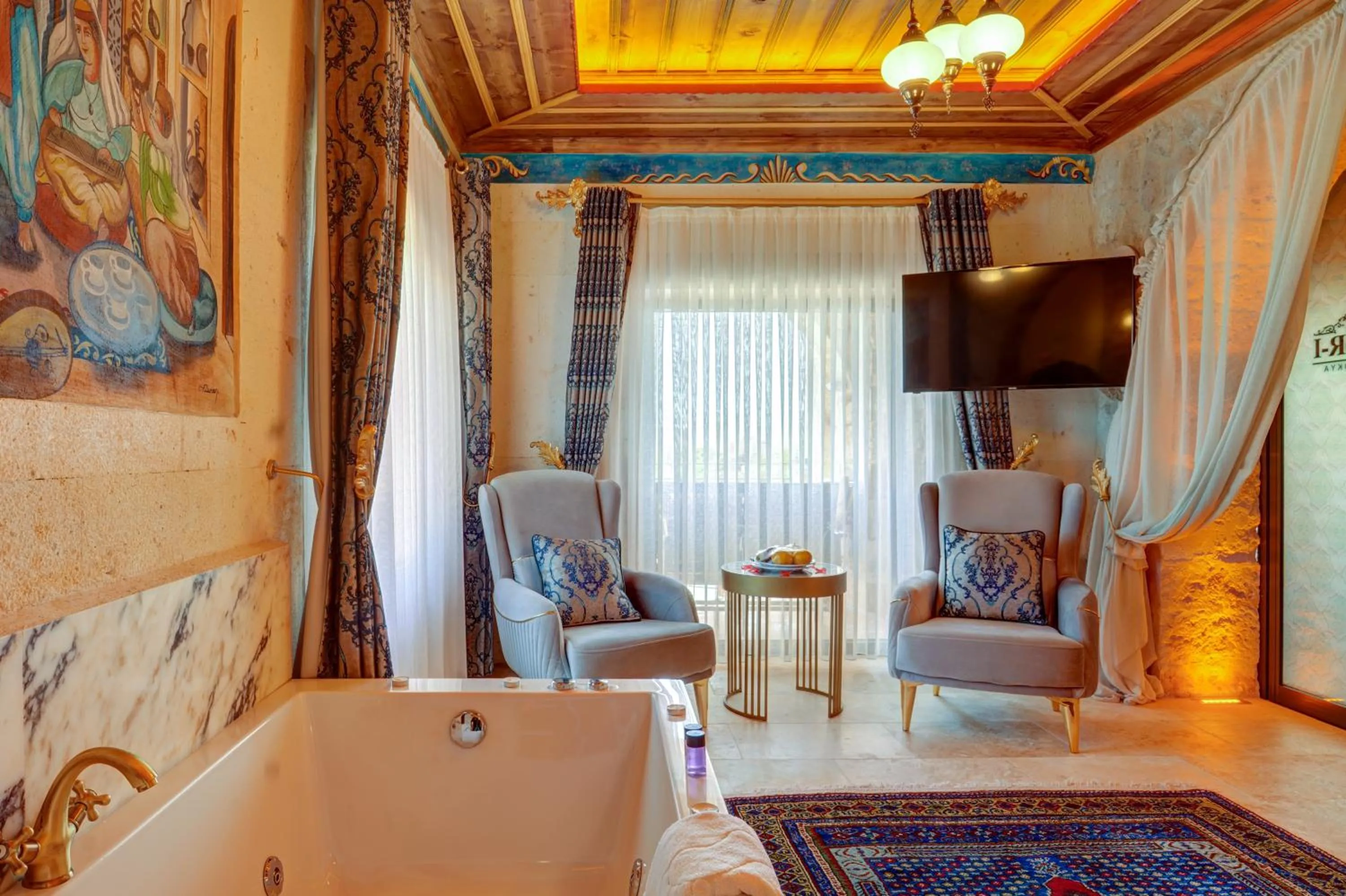 Seating area in Kasr-ı Kapadokya Cave Suites