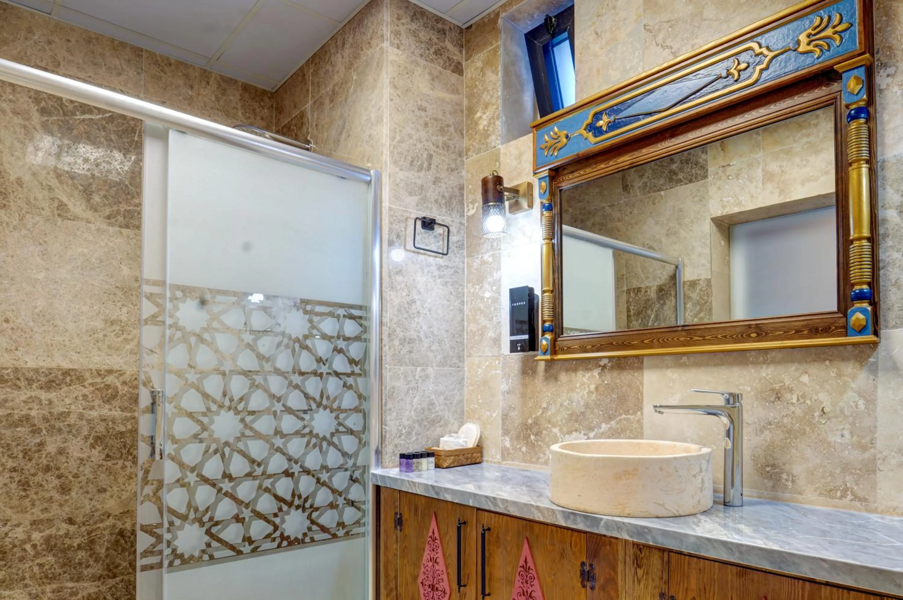 Shower in Kasr-ı Kapadokya Cave Suites